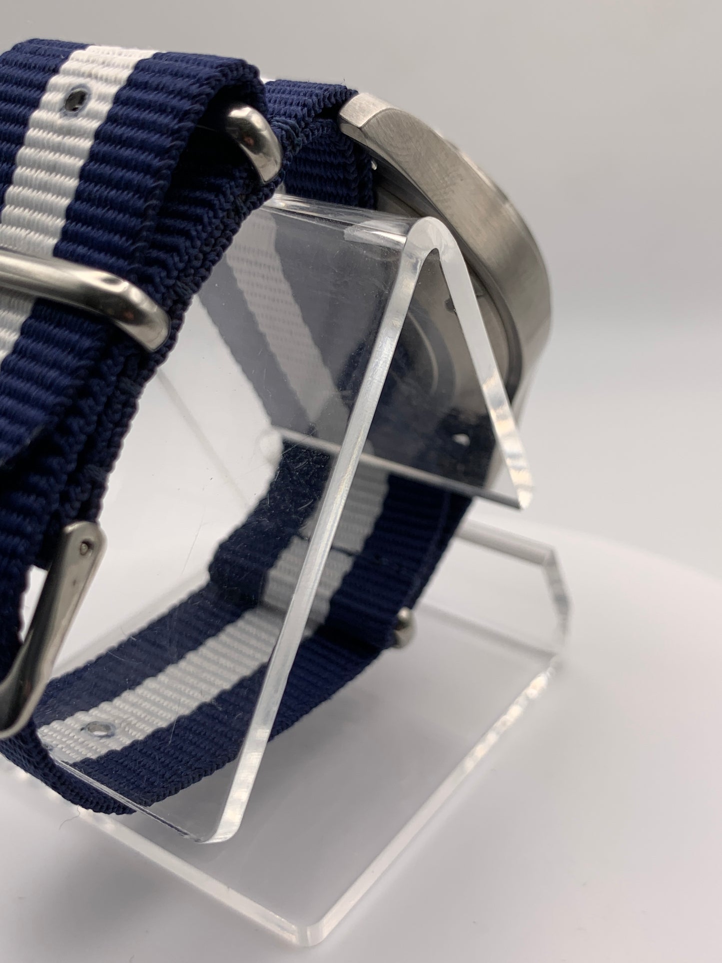 Cloth & Steel. 38mm brushed stainless steel. Ornate dial. Sapphire crystal. Seiko NH38