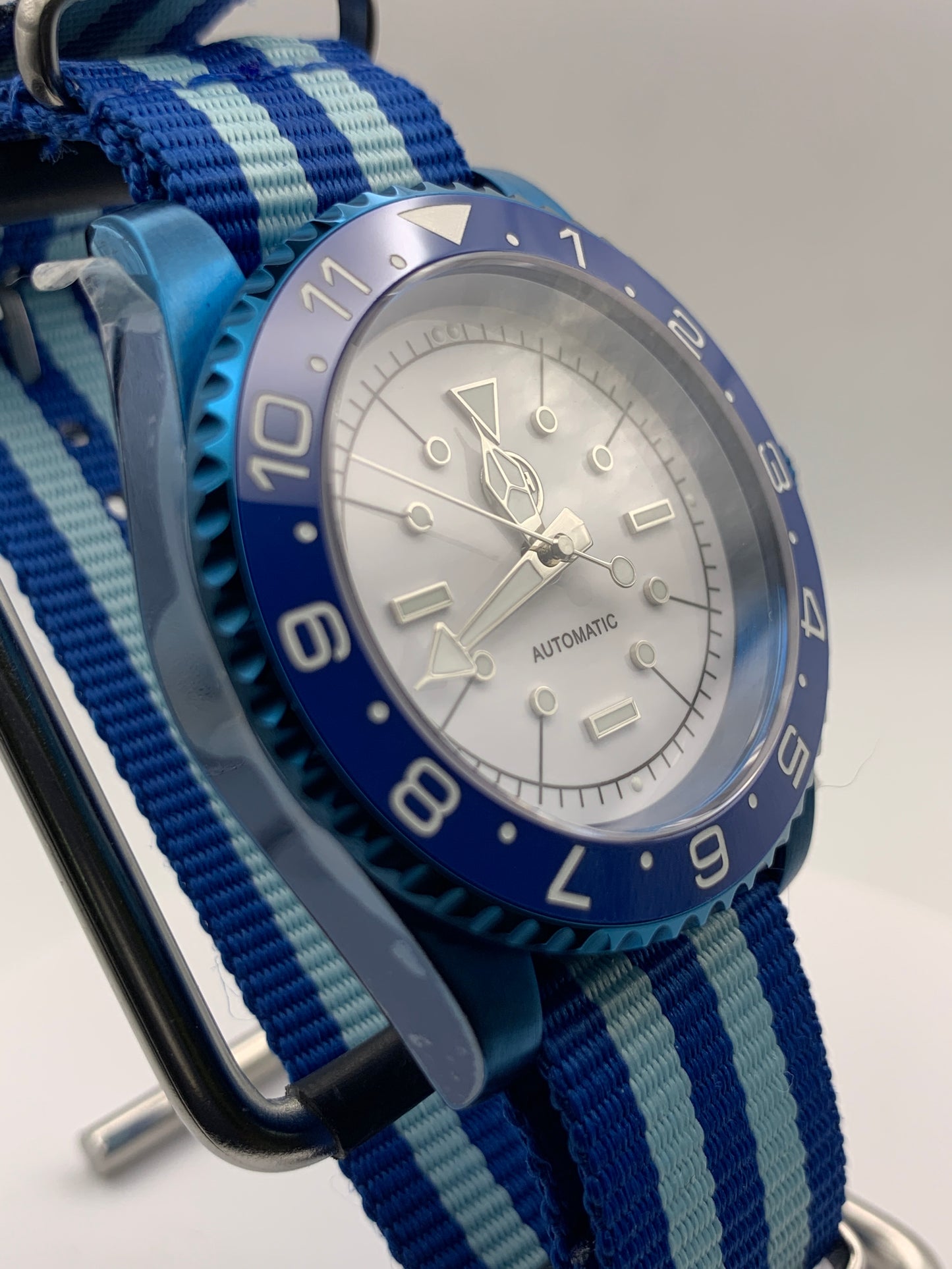 Europa - 41mm Blue anodized stainless steel case. Sapphire crystal. Seiko NH38.