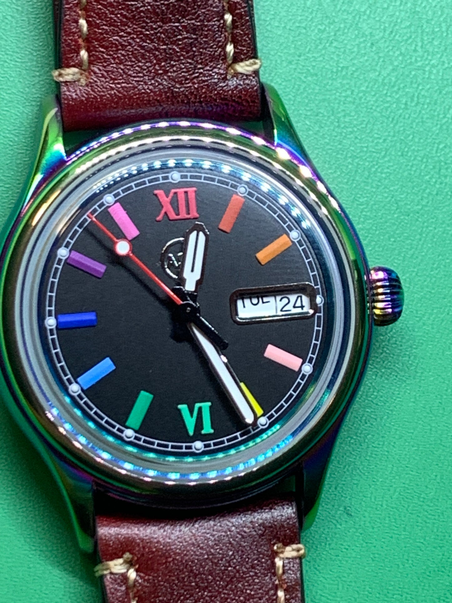Living Color. 38mm thermally colored stainless steel case and case back. Double dome K-1 mineral crystal. Seiko NH36