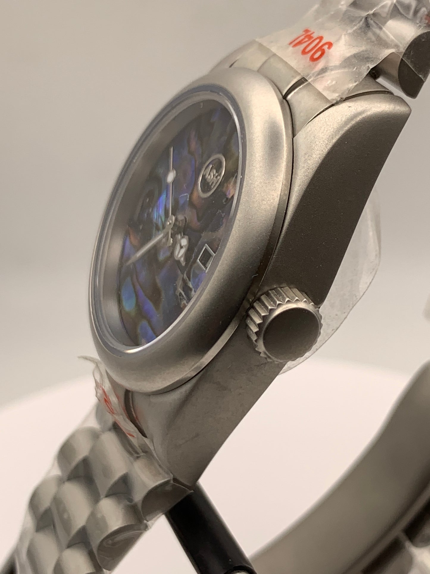 Microcosm. 31mm Brushed stainless steel with matching bracelet. Sapphire crystal. Seiko NH05 automatic.
