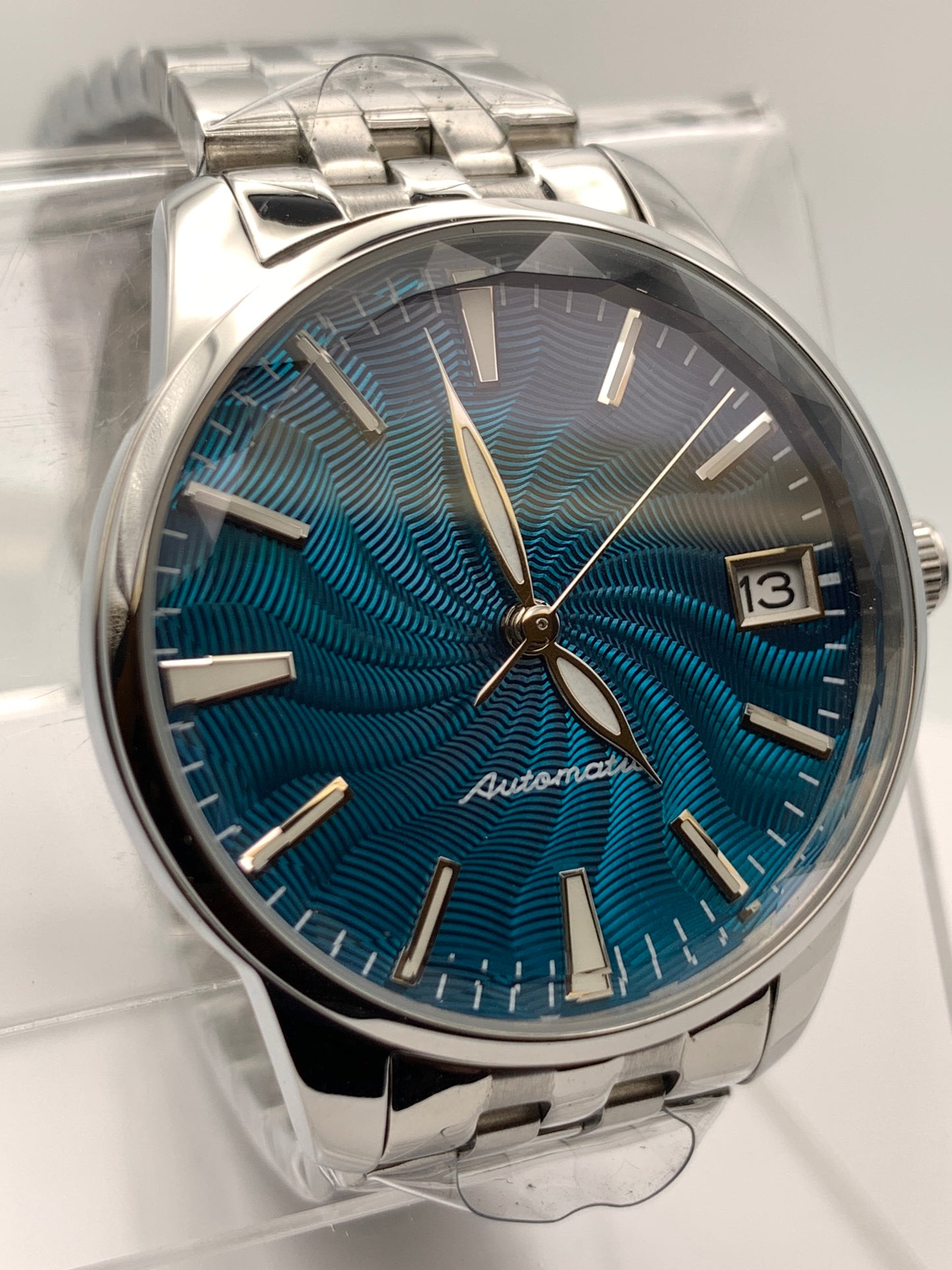 The Teal. Highly figured dress watch. 33mm stainless steel case. Faceted and domed acrylic crystal. NH35.