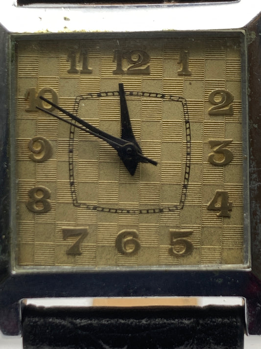 Feather.  Heavy patina vintage hinged brass case. 25 x 33mm. Beautiful figured vintage dial. Acrylic crystal. Miyota 2036 quartz movement.