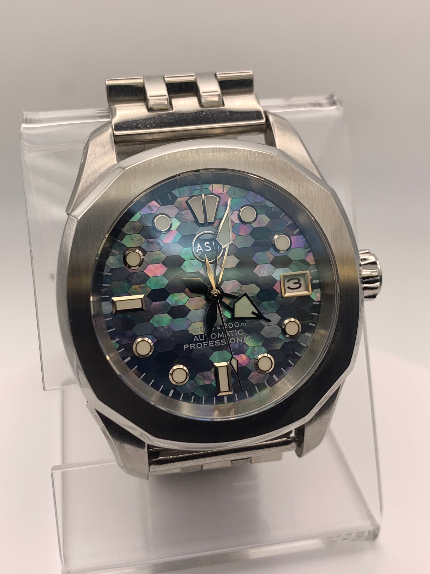 Spectrum. Mosaic mother of pearl dial. 38mm Stainless steel case. Sapphire crystal. NH35 automatic movement.