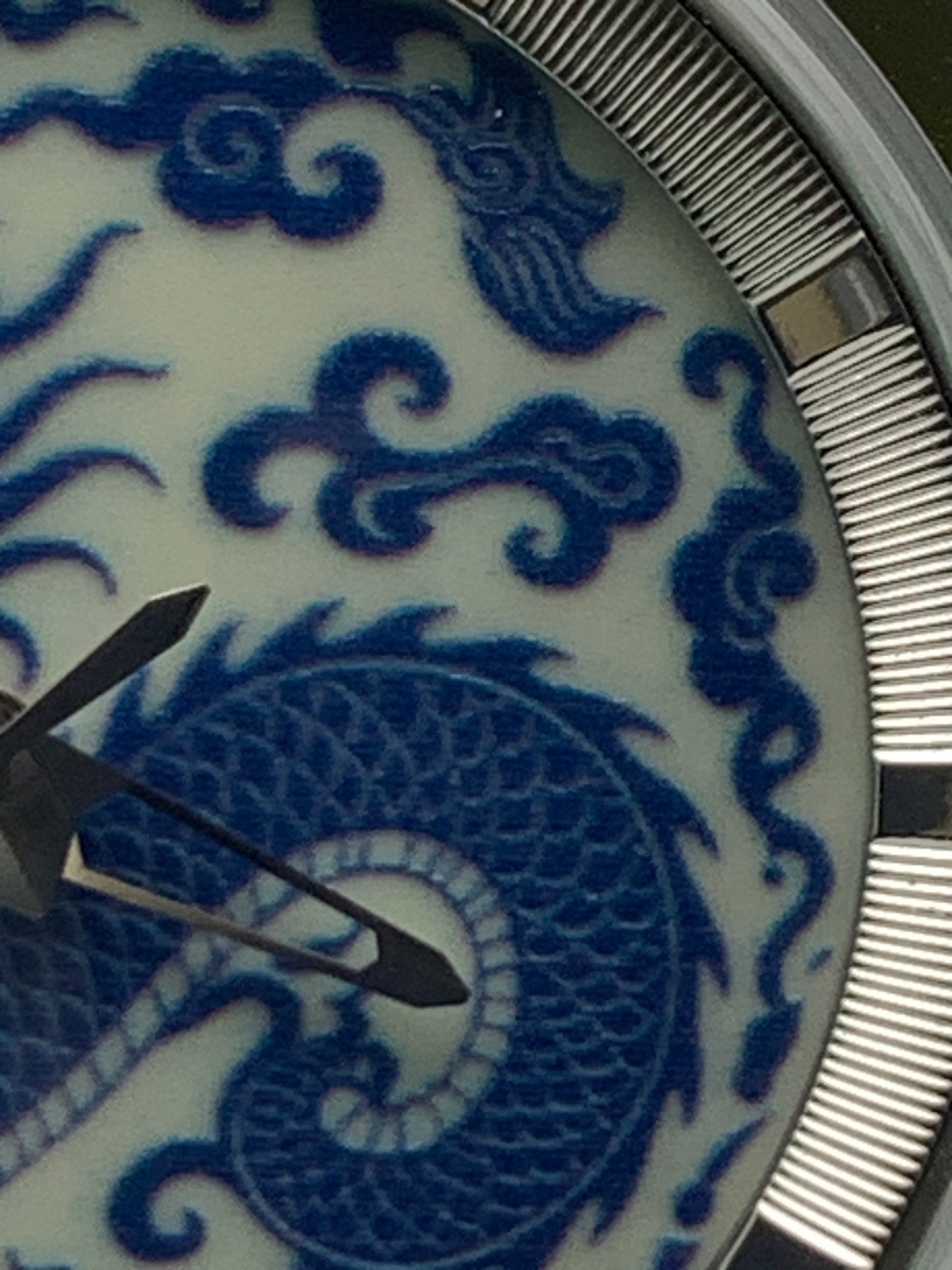 Qinglong - 39mm stainless steel case with engine turned chapter ring. Sapphire crystal. Seiko NH38.