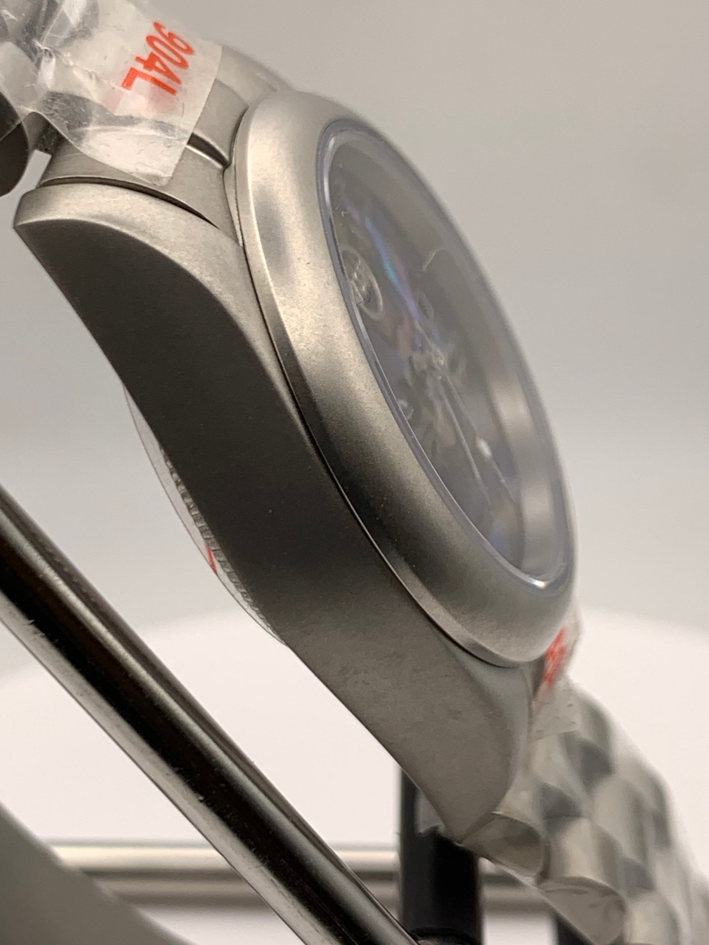 Microcosm. 31mm Brushed stainless steel with matching bracelet. Sapphire crystal. Seiko NH05 automatic.