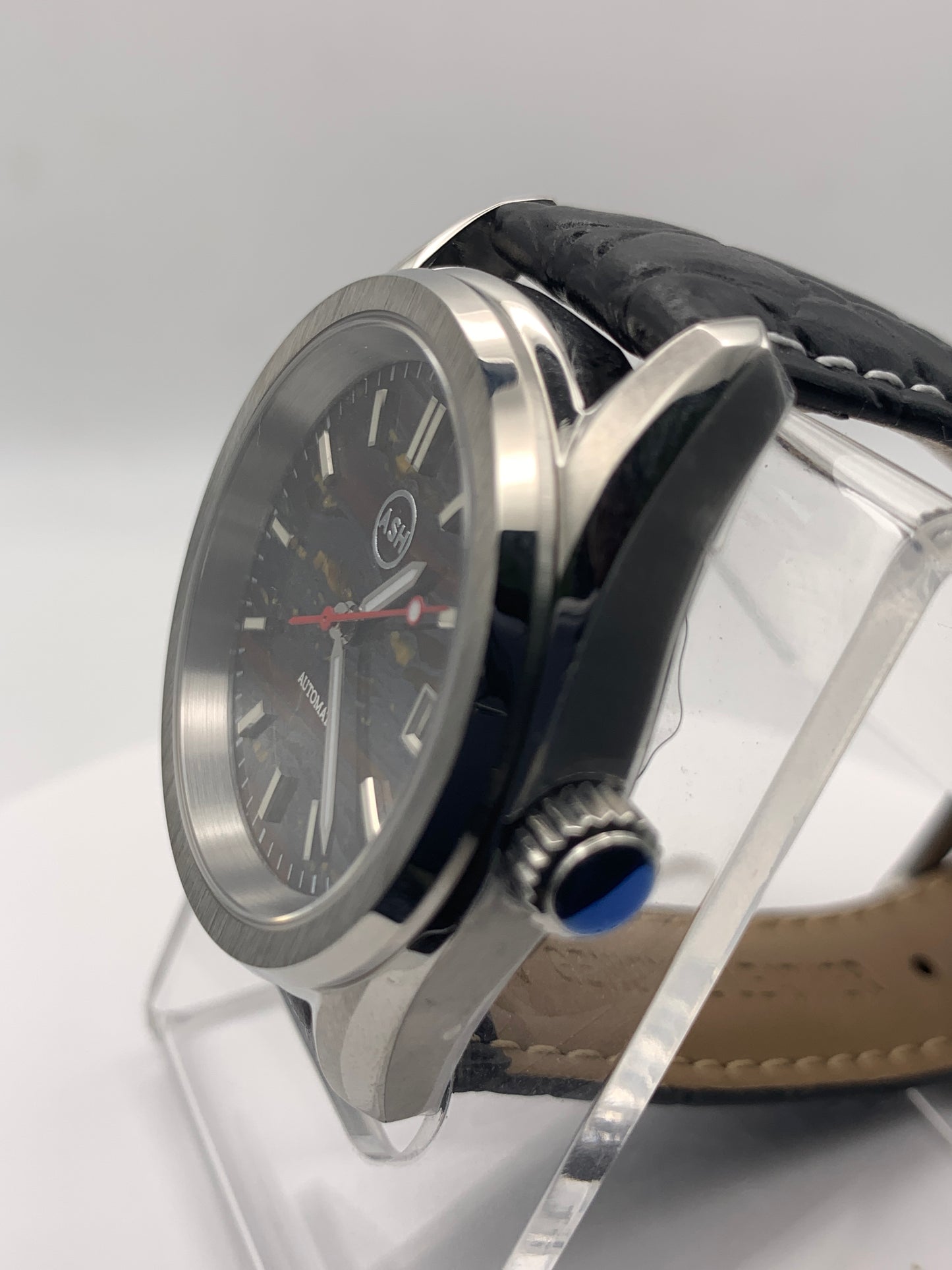 Agharta. 39mm Stainless steel. Iron Tiger Eye dial. Sapphire crystal. Seiko NH35.