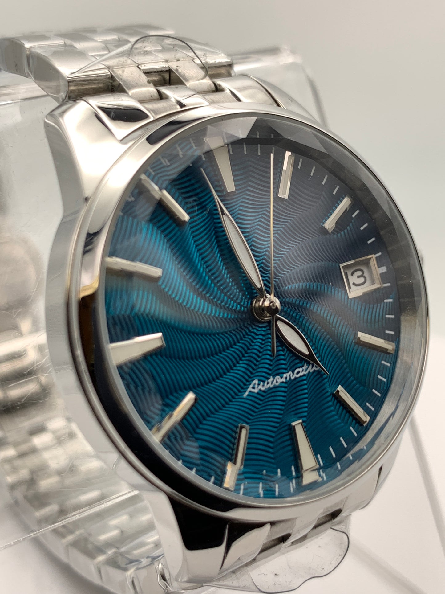 The Teal. Highly figured dress watch. 33mm stainless steel case. Faceted and domed acrylic crystal. NH35.