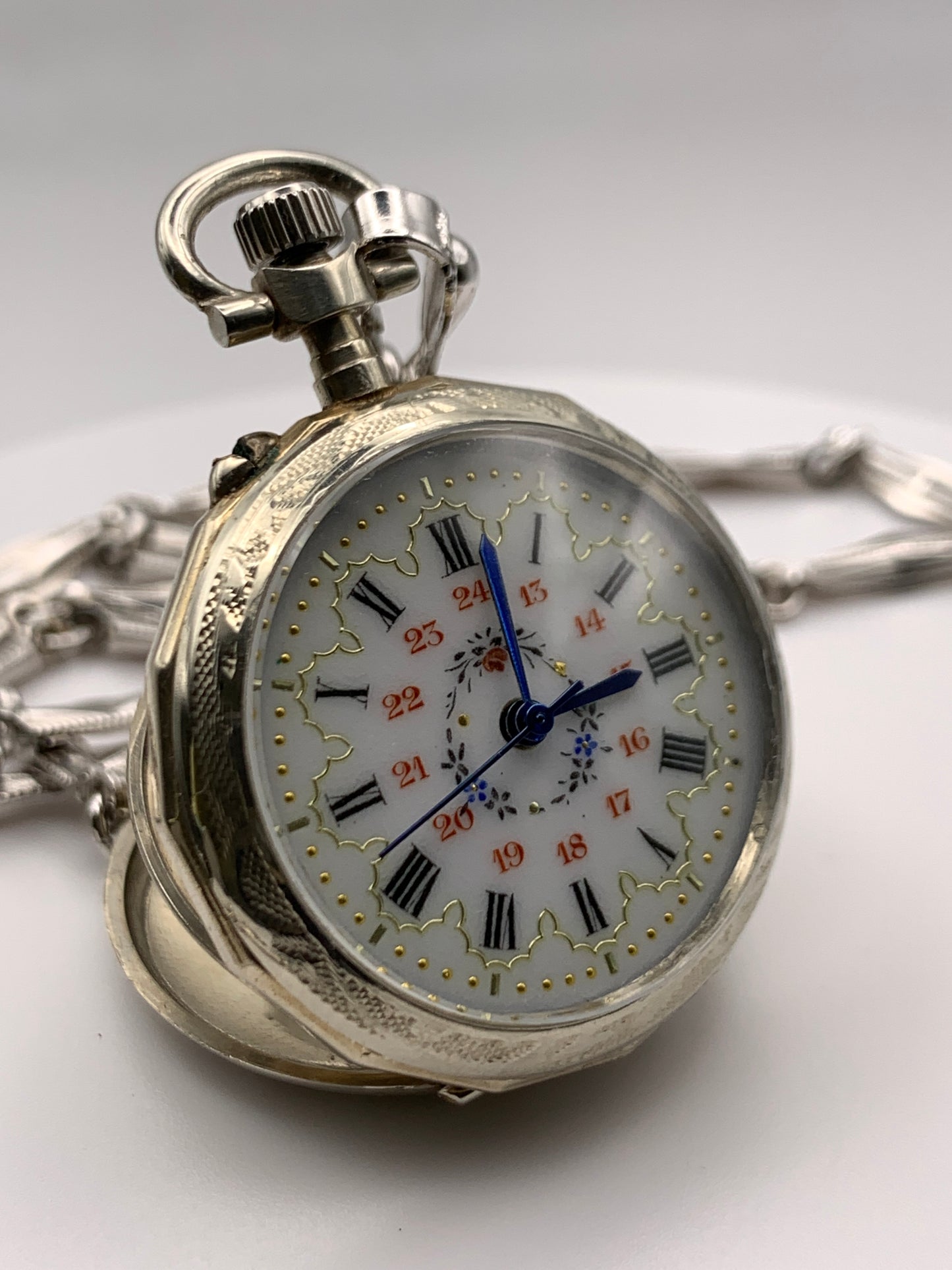 ‘Sold - Amuse-bouche. 30mm pocket / necklace watch. NOS Argentan alloy case and hand painted enamel dial. Sapphire crystal. Miyota 2036. 24” sterling necklace.