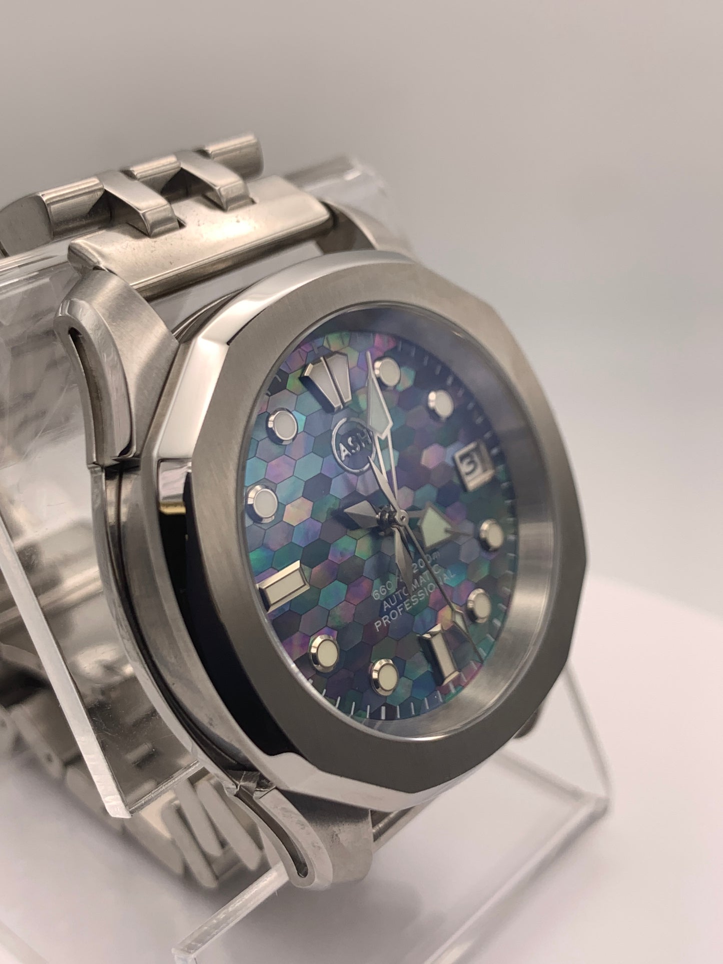 Spectrum. Mosaic mother of pearl dial. 38mm Stainless steel case. Sapphire crystal. NH35 automatic movement.