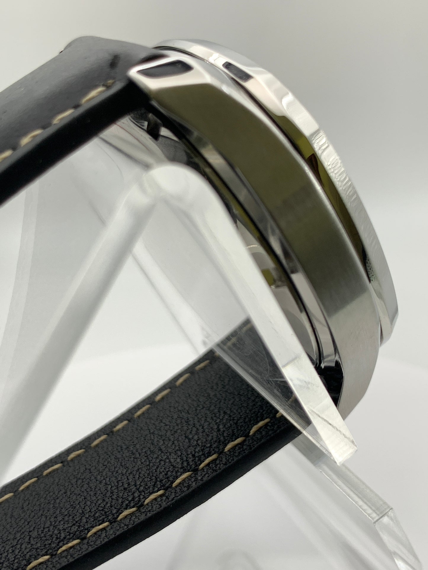 40mm Silver on silver dress watch.