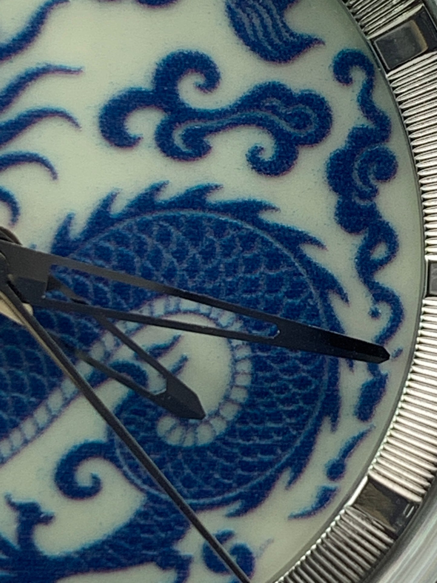 Qinglong - 39mm stainless steel case with engine turned chapter ring. Sapphire crystal. Seiko NH38.