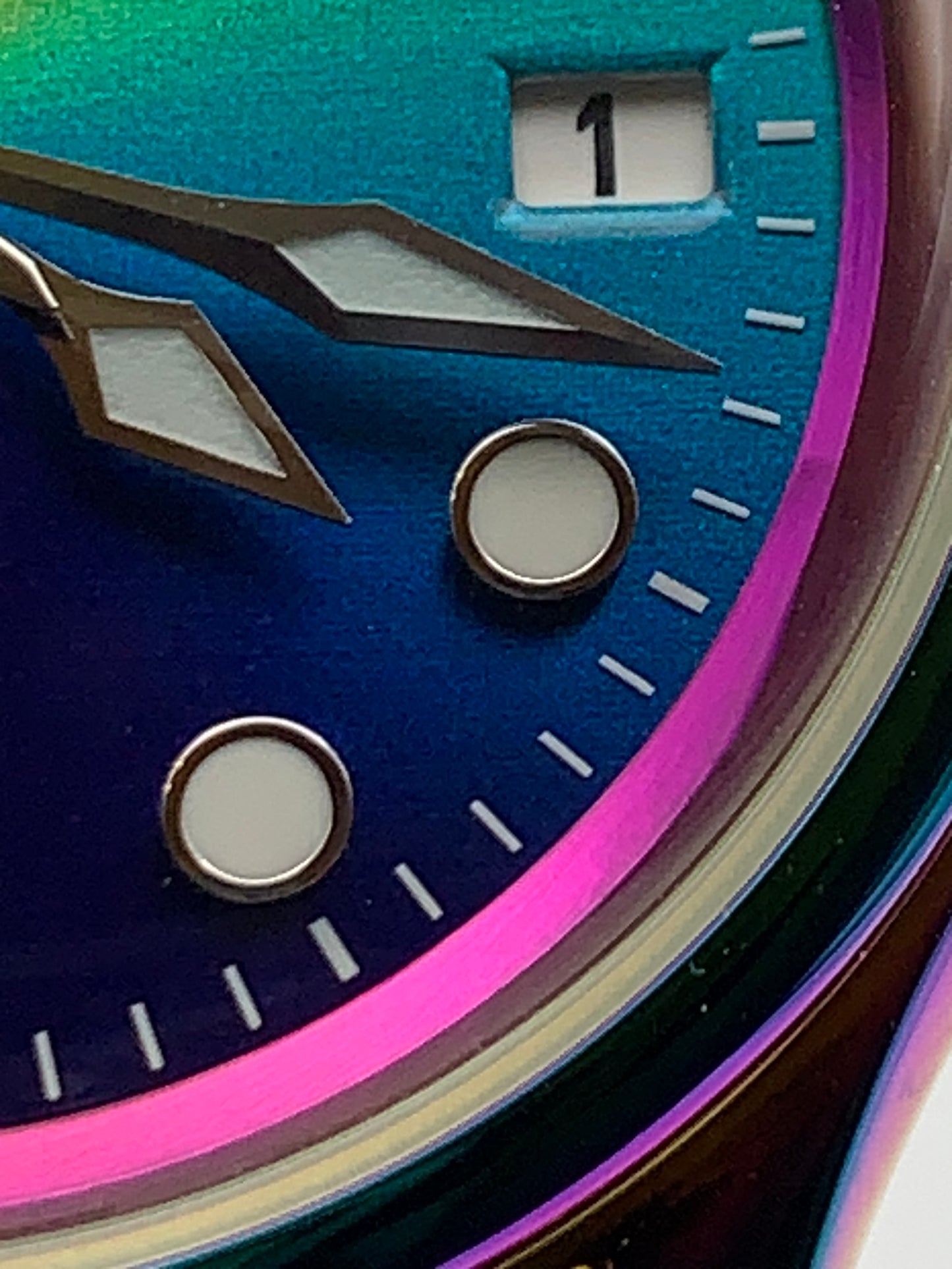 Portable rainbow. 38mm thermally colored stainless steel case and case back. Double dome K-1 mineral crystal. Seiko NH35.