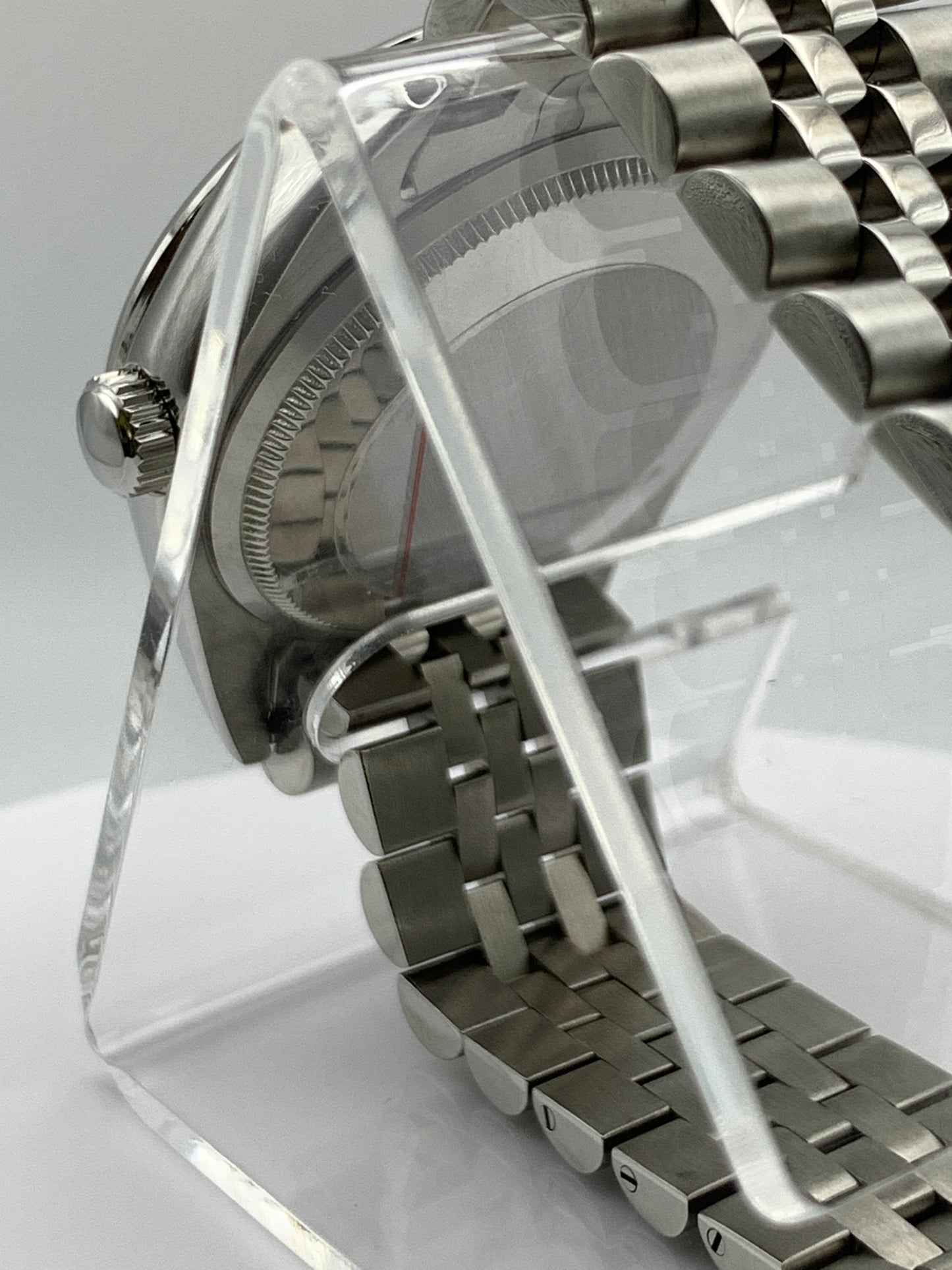 Pale yellow 36mm sport watch on bracelet.