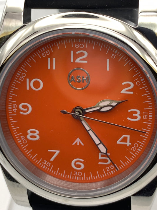 Blood Orange.  39mm stainless steel field watch. Sapphire crystal. NH38 automatic.
