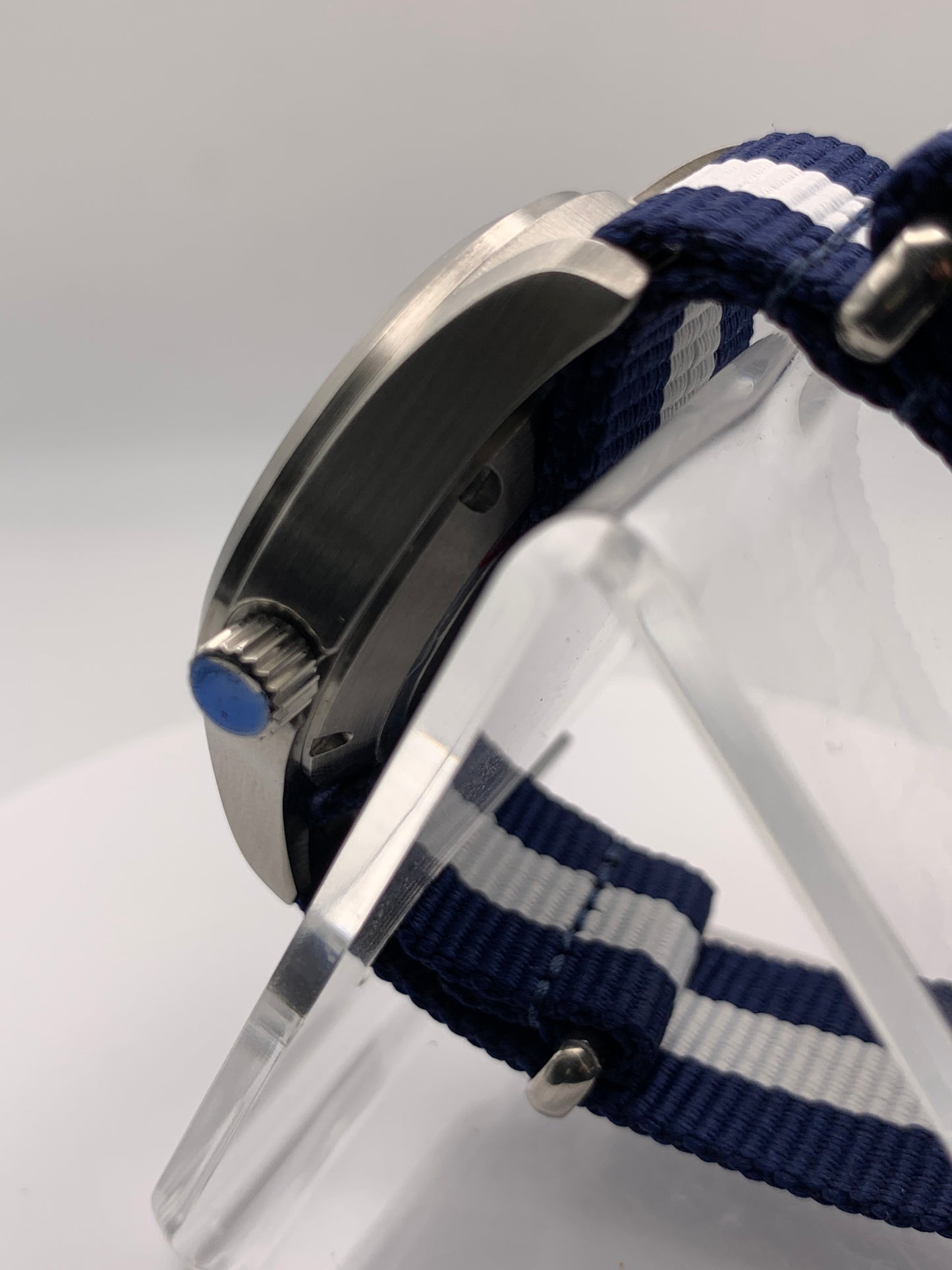 Cloth & Steel. 38mm brushed stainless steel. Ornate dial. Sapphire crystal. Seiko NH38