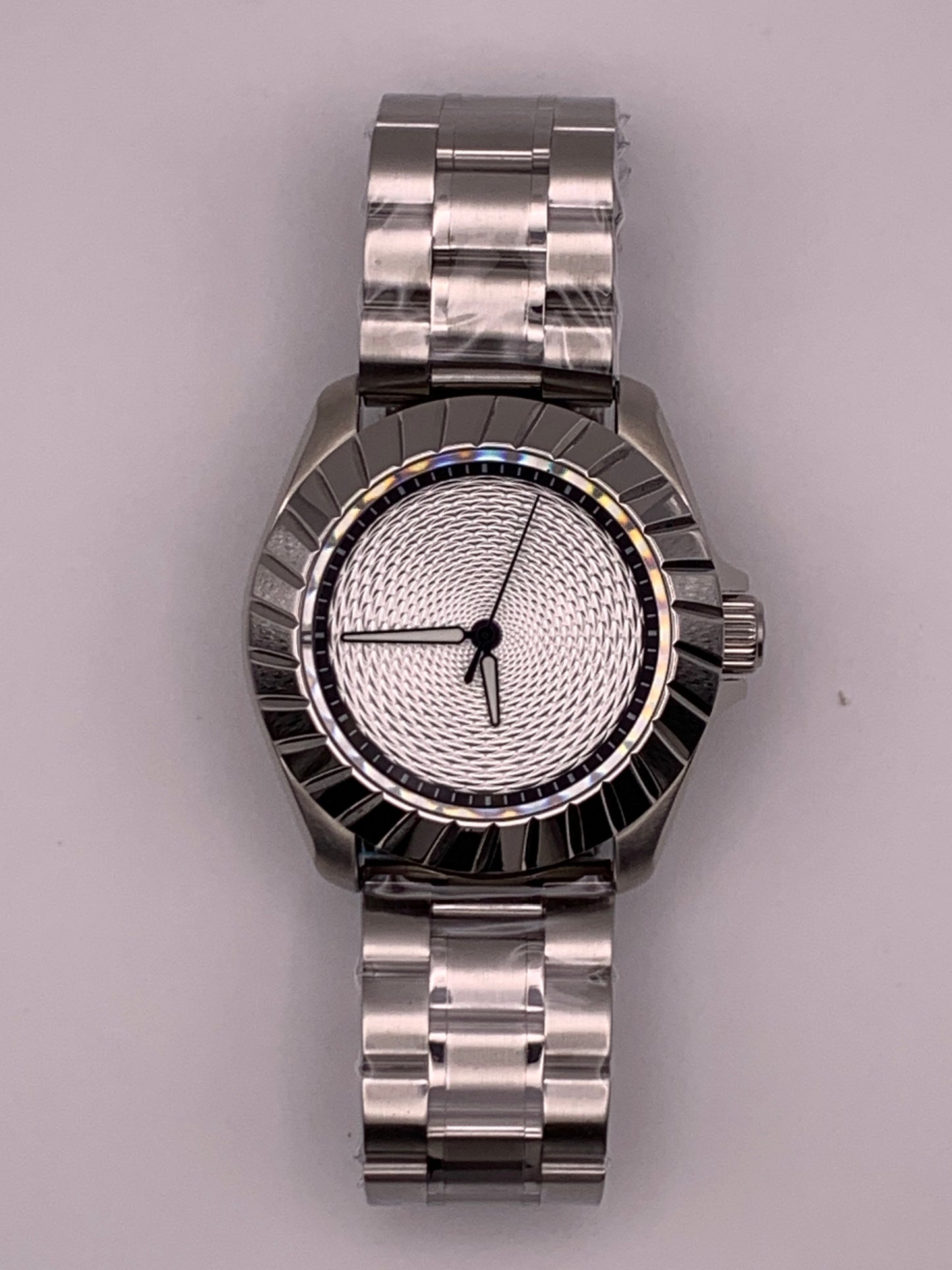 Indra’s Net. 41mm Stainless steel case.  Sapphire crystal. Seiko NH38.