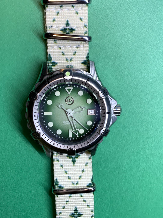 Thymekeeper.  42mm Stainless steel case.  Sapphire crystal. Seiko NH35.