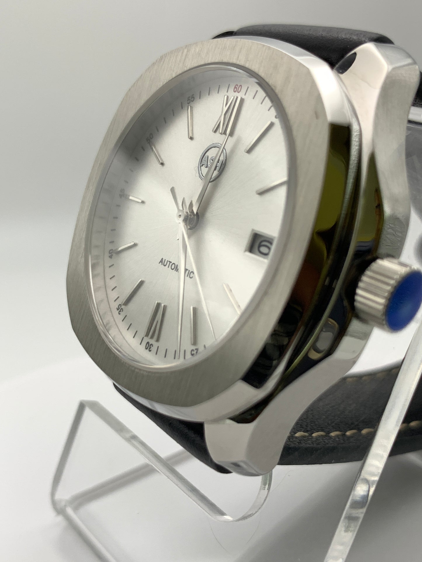 40mm Silver on silver dress watch.