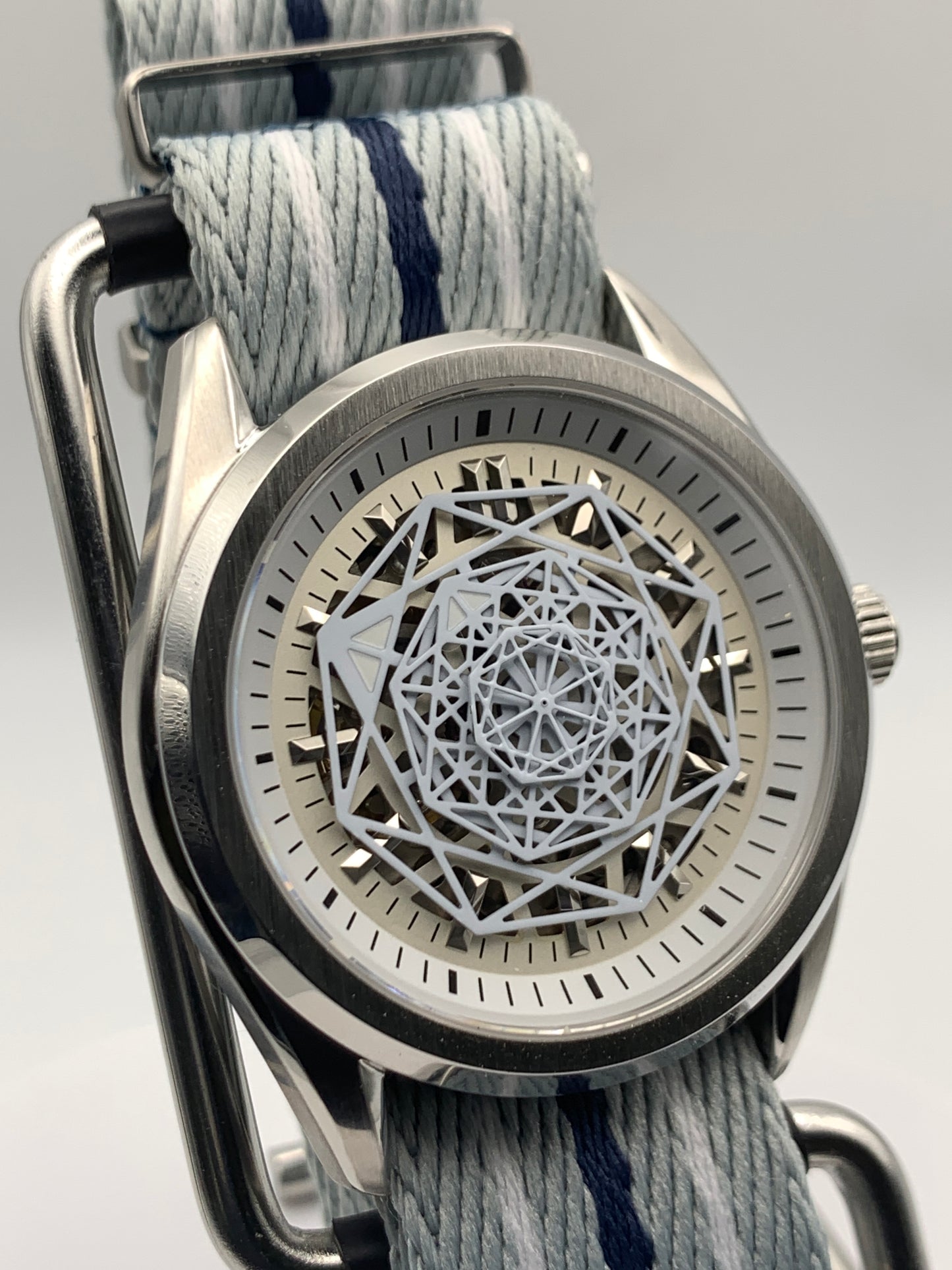 Blizzard - 40mm Stainless steel case. Sapphire crystal.  Snowflake dial and handset. Seiko NH70 skeleton automatic.