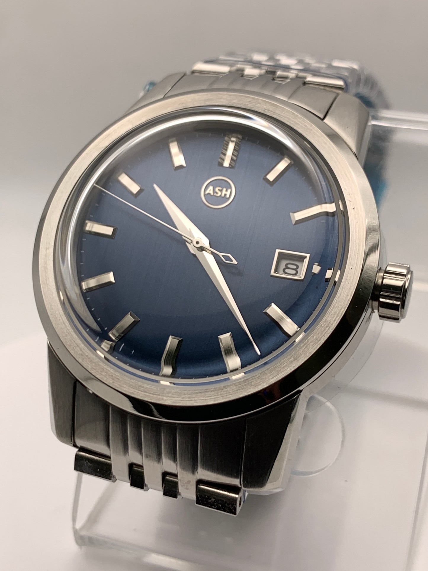 Nocturne. 40mm stainless steel case with matching bracelet. Box sapphire crystal. Seiko NH35