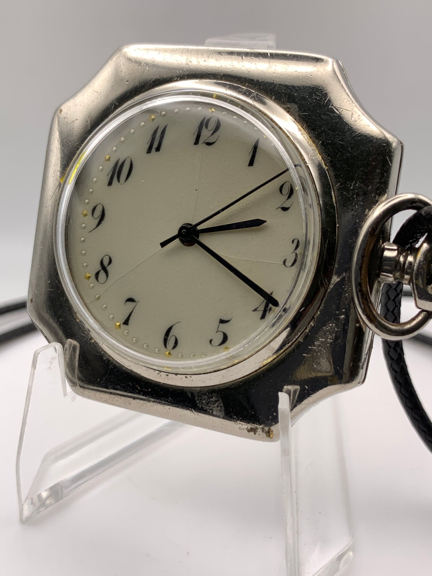 Palimpsest.  40 x 40mm plated brass case. Vintage pendant watch conversion. Domed acrylic crystal. Original enamel dial. Miyota 2036.