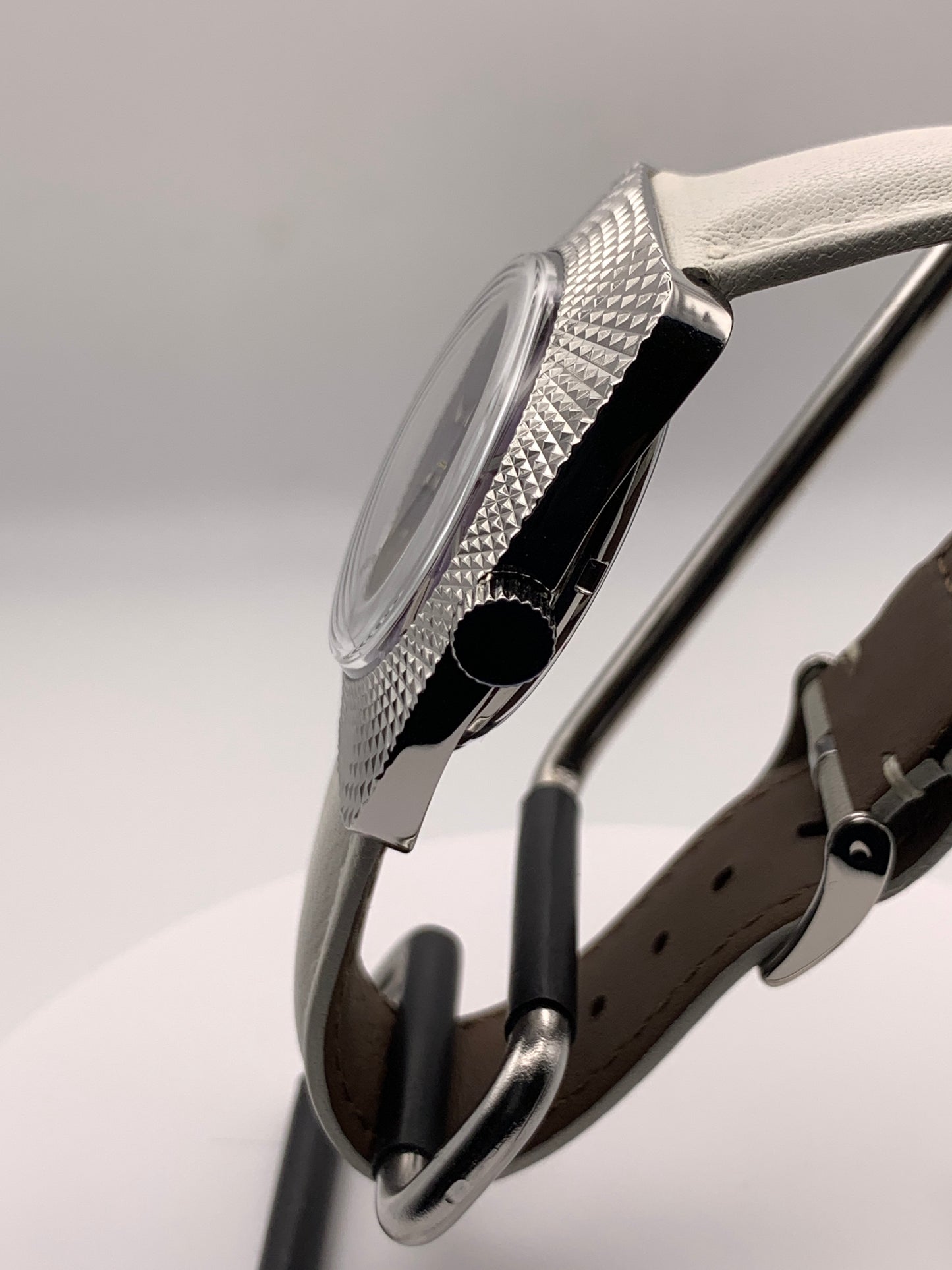 Lily. Faceted 37mm stainless steel case. Acrylic domed crystal. Charlotte stone dial.  Seiko VH31 mecha-quartz.