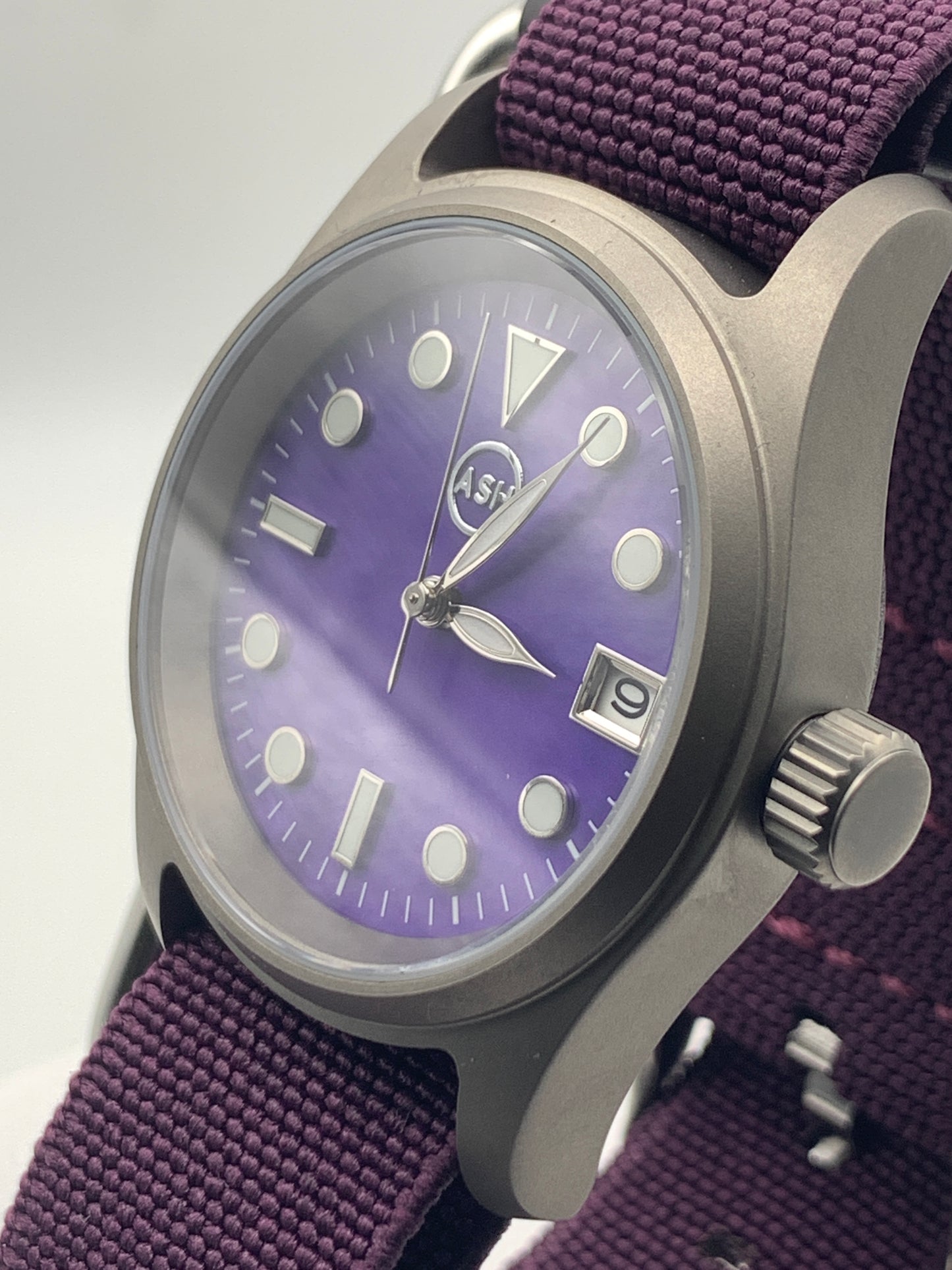 Larkspur. 36mm Titanium field watch. Purple MOP dial. Seiko NH35.