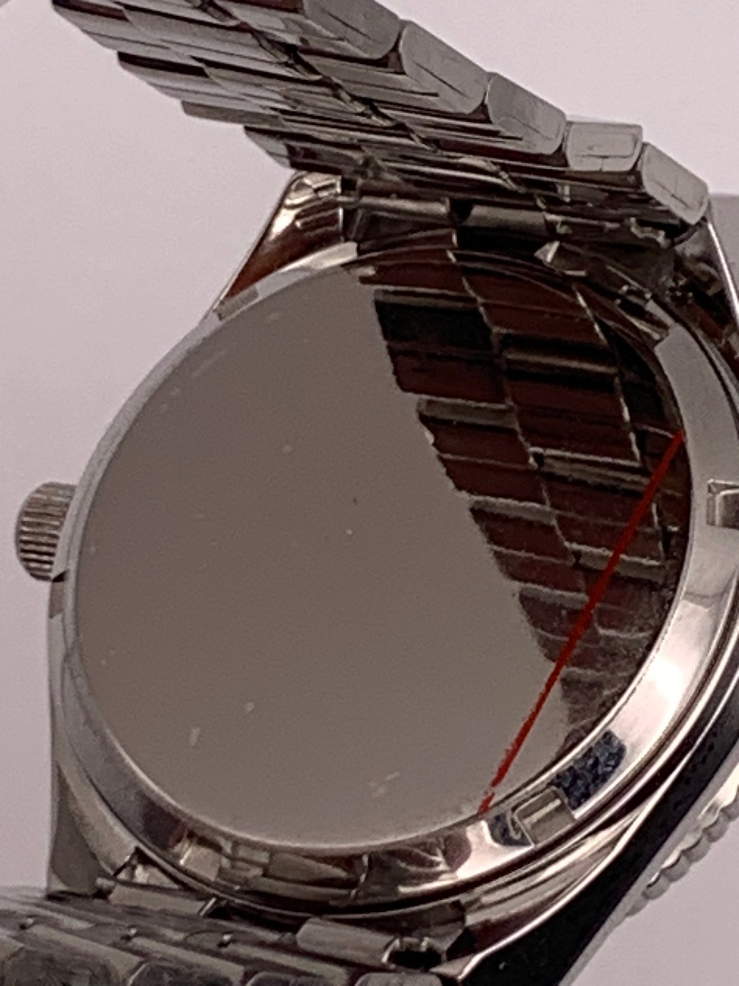 Poguelite. 37mm Stainless steel case. Acrylic domed crystal. Seiko NH35 with black date wheel. NOS vintage bracelet.