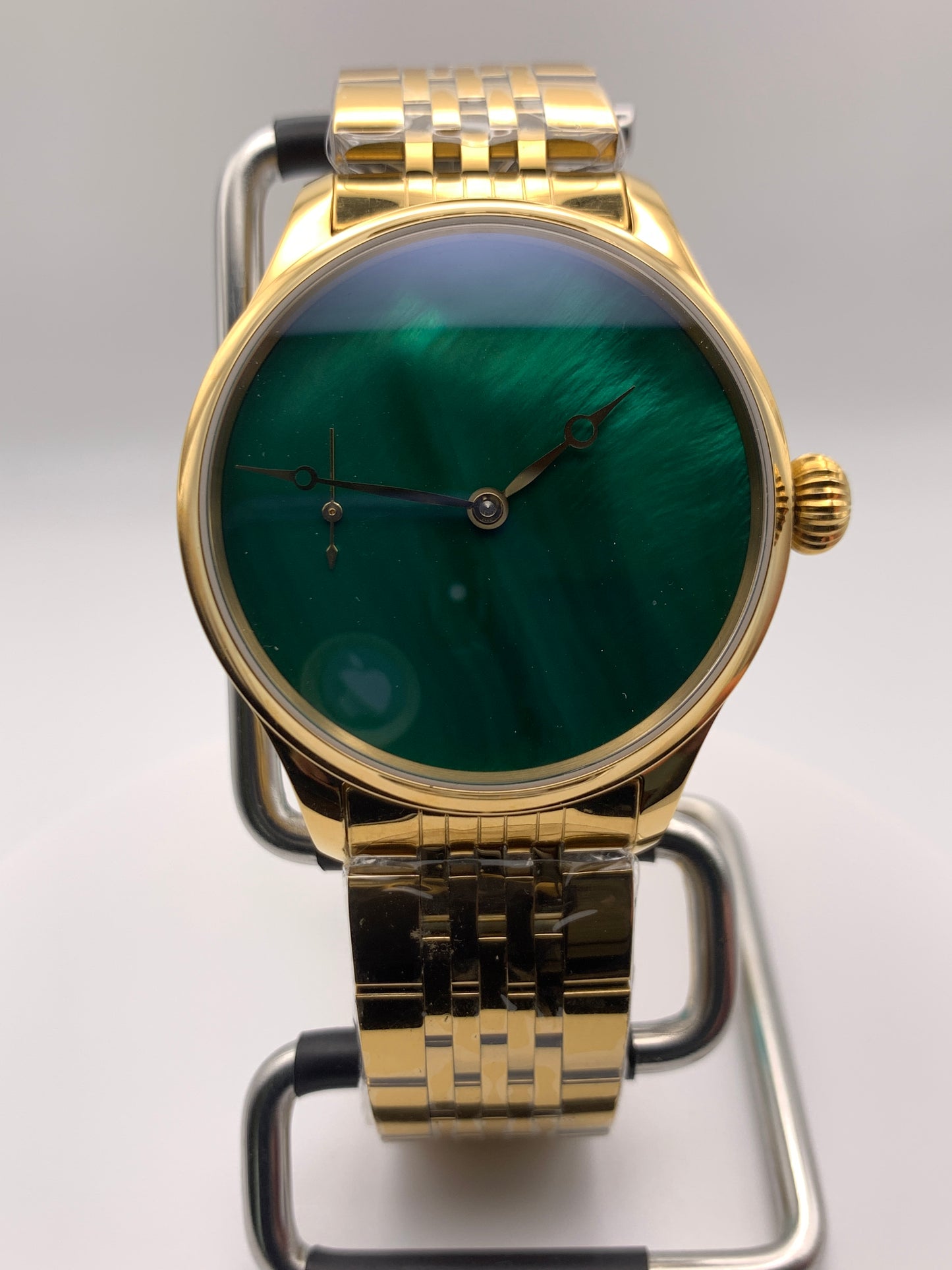 Spring Island. 41mm 18k plated stainless steel case. Sapphire crystal