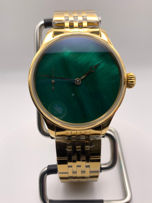 Spring Island. 41mm 18k plated stainless steel case. Sapphire crystal