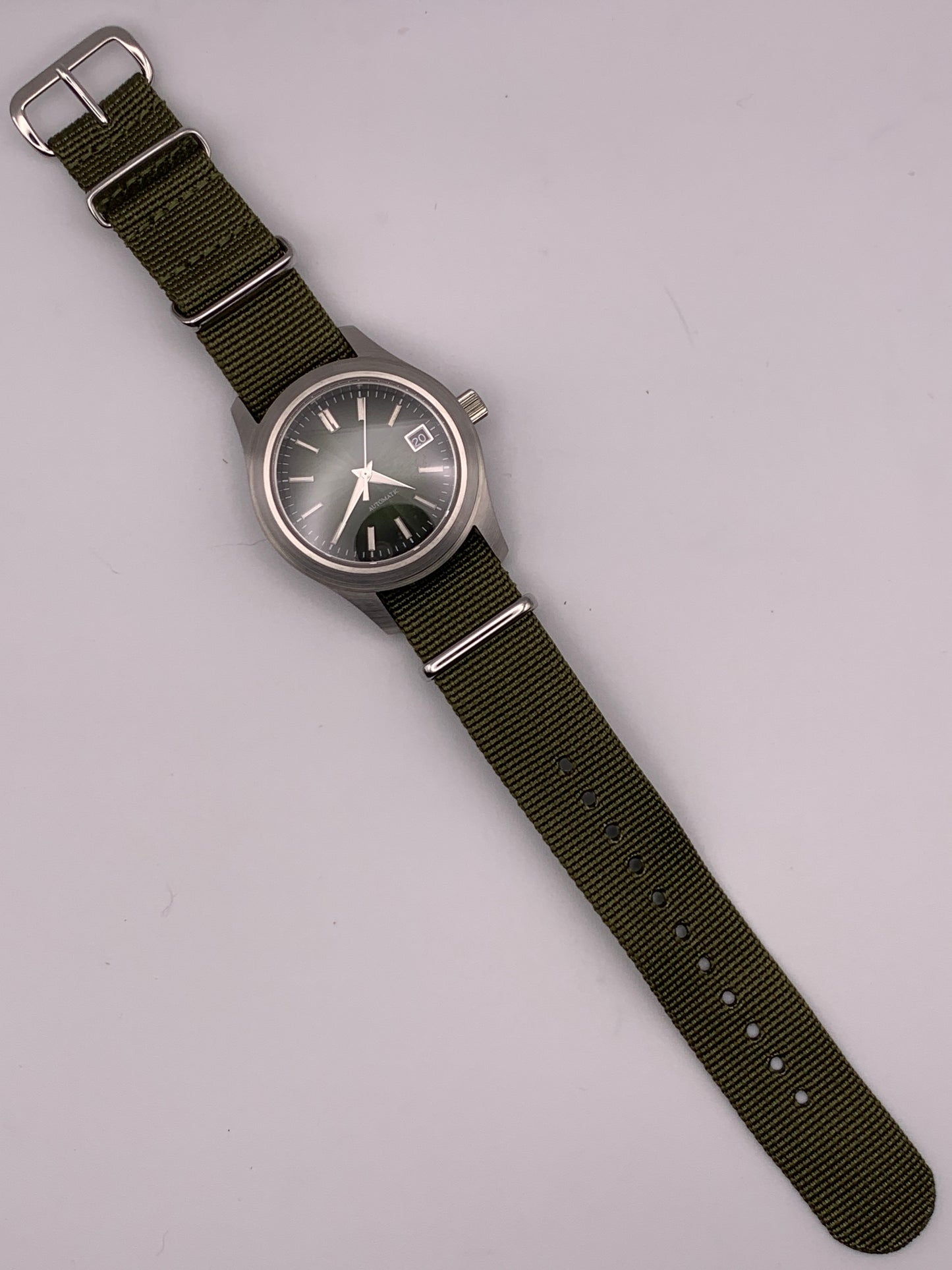 Fangorn 1.3 - 39mm brushed stainless steel. Sapphire crystal. Textured dial. Seiko NH35 with black date dial.