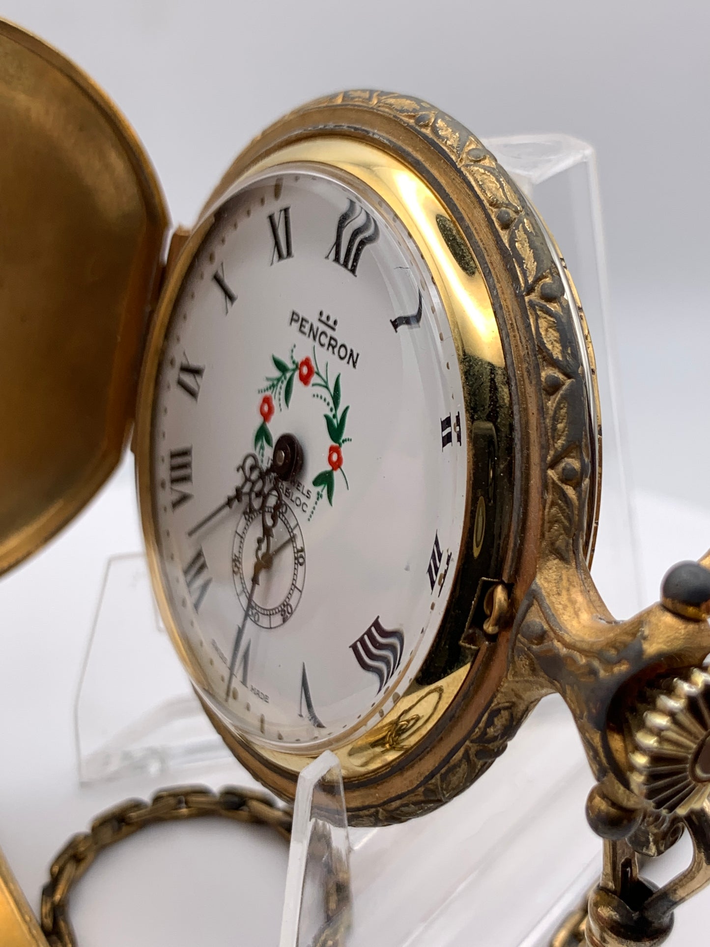 Pencron 44mm Swiss pocket watch. Unitas 6325 hand winding movement. Acrylic dome. Period correct chain and pocket knife.