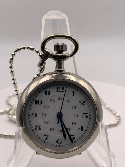 Amuse-bouche III.  Pendant / necklace watch. 30mm Argentan case. Sapphire crystal. Miyota 2036. 24” chain.