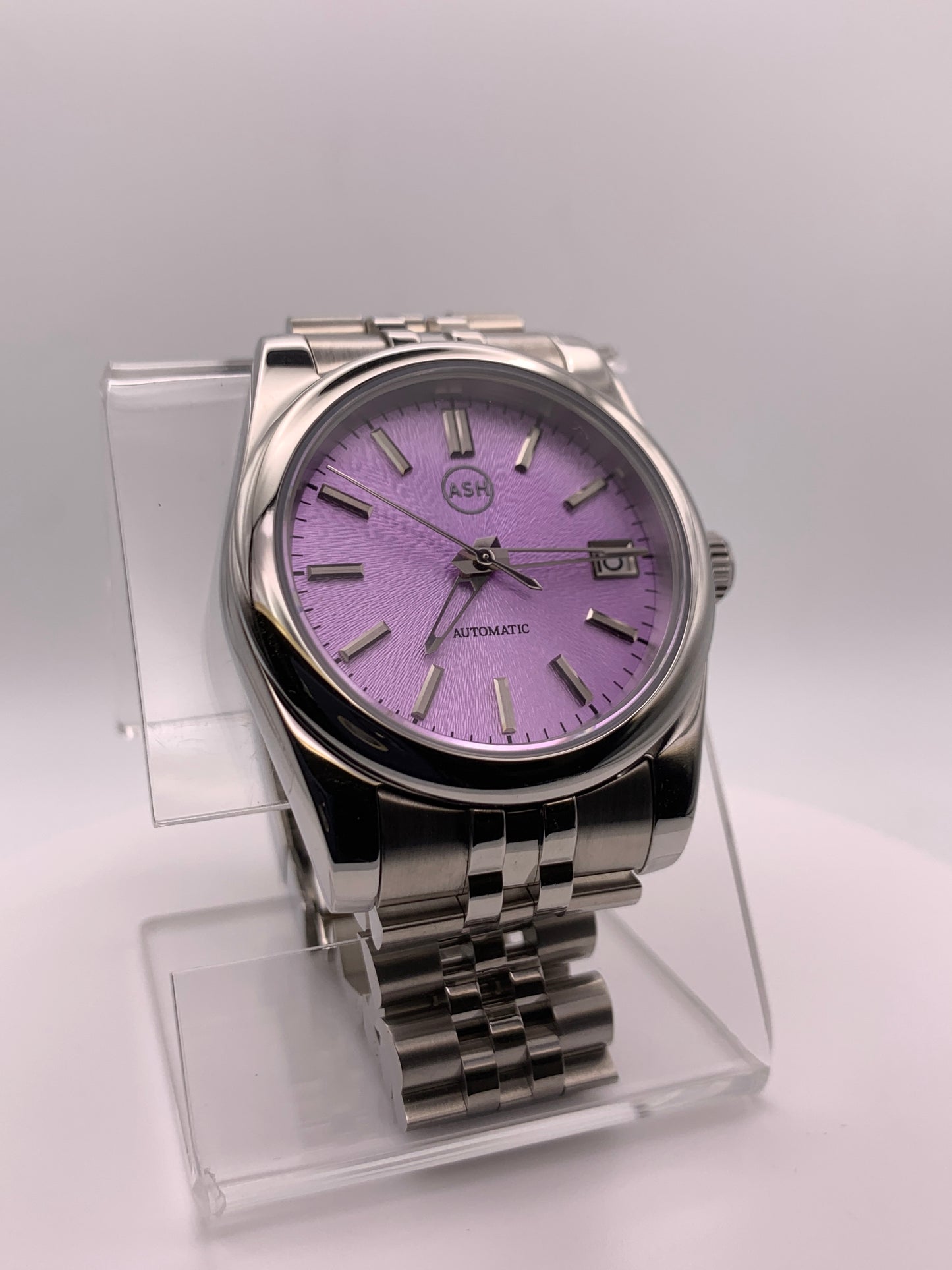‘Sold - Highly figured lavender dial. 36mm sport watch on bracelet.