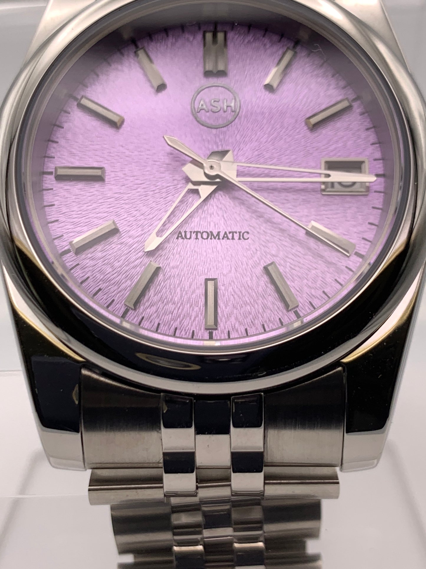 ‘Sold - Highly figured lavender dial. 36mm sport watch on bracelet.