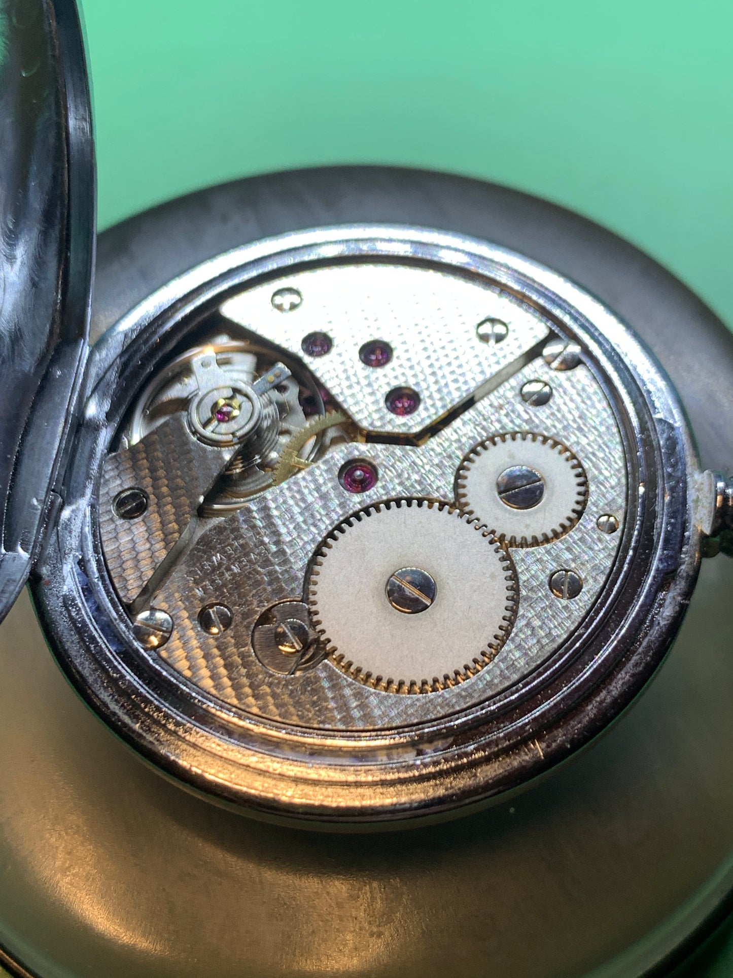 White Dahlia. All Swiss pocket watch. Beautiful NOS ETA/Unitas hammertone 6498 hand wound movement. Guilloche dial. Vintage 47mm case with perlage.