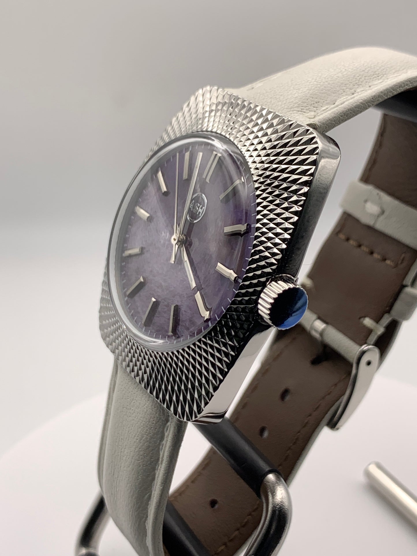 Lily. Faceted 37mm stainless steel case. Acrylic domed crystal. Charlotte stone dial.  Seiko VH31 mecha-quartz.
