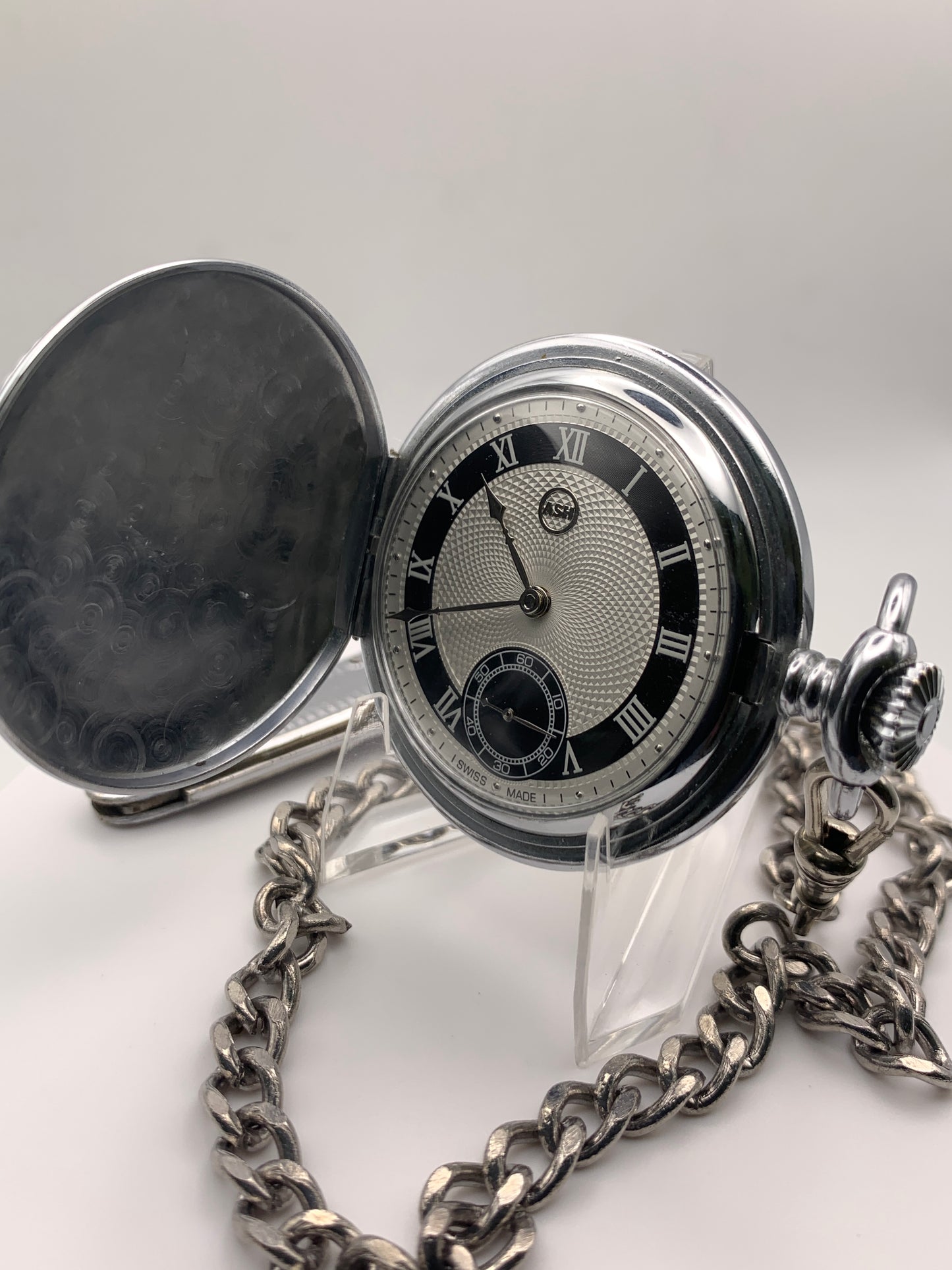 White Dahlia. All Swiss pocket watch. Beautiful NOS ETA/Unitas hammertone 6498 hand wound movement. Guilloche dial. Vintage 47mm case with perlage.