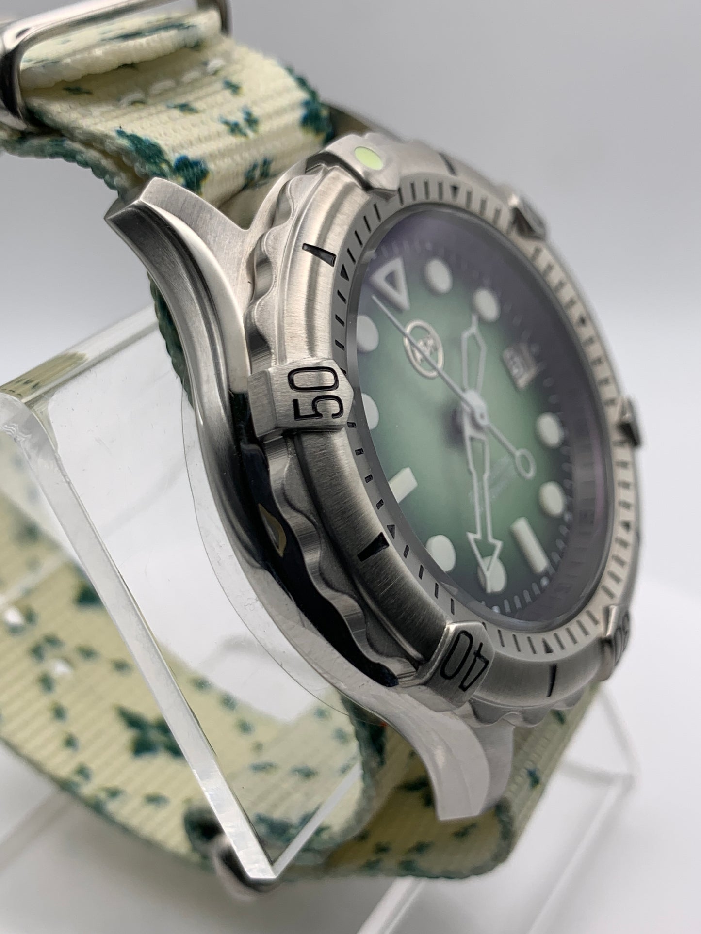 Thymekeeper.  42mm Stainless steel case.  Sapphire crystal. Seiko NH35.