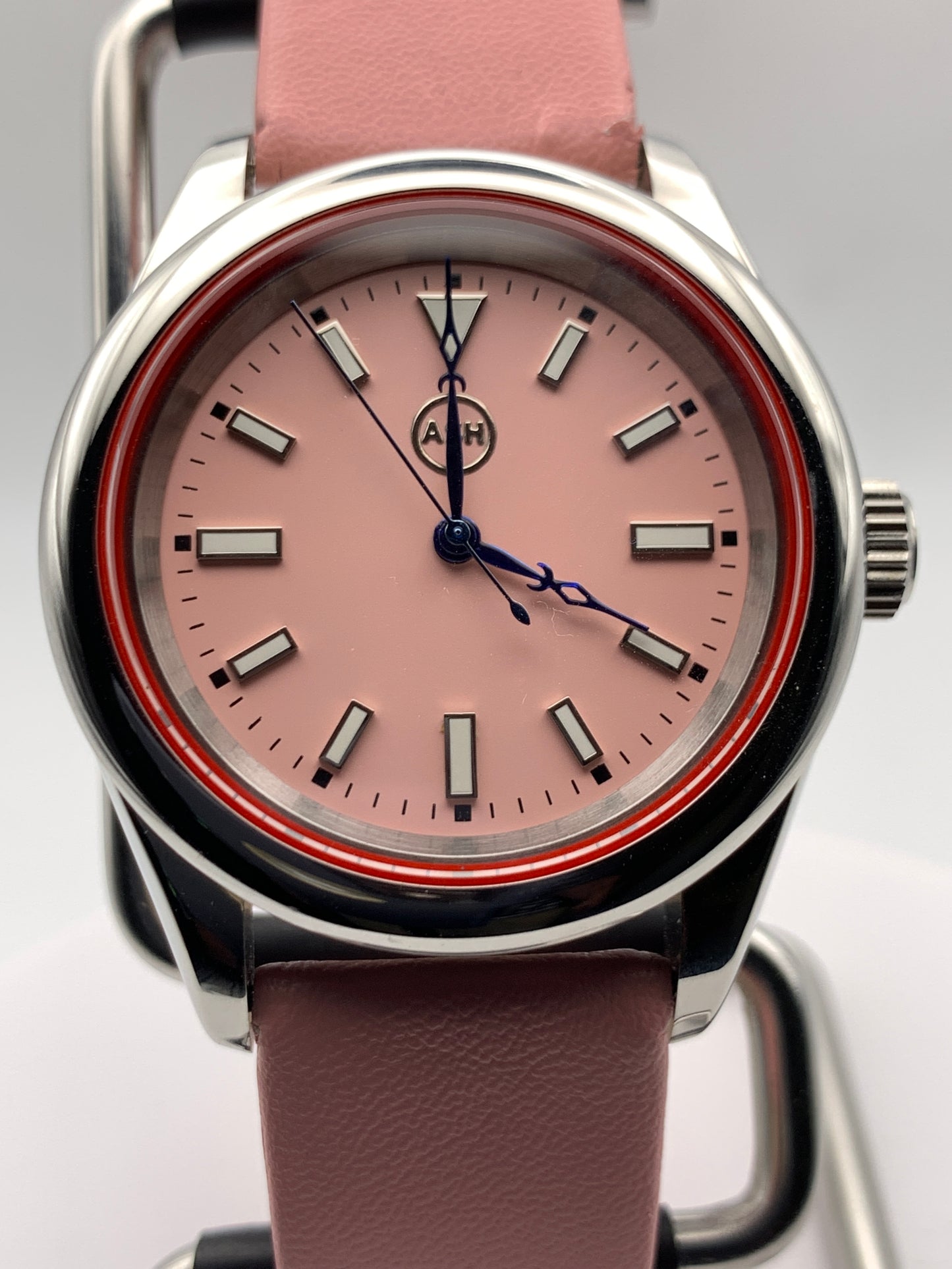 Versailles 1.1 - 39mm Stainless steel case with red gasket. Sapphire crystal. Exhibition case back. Seiko NH38 with blue rotor.