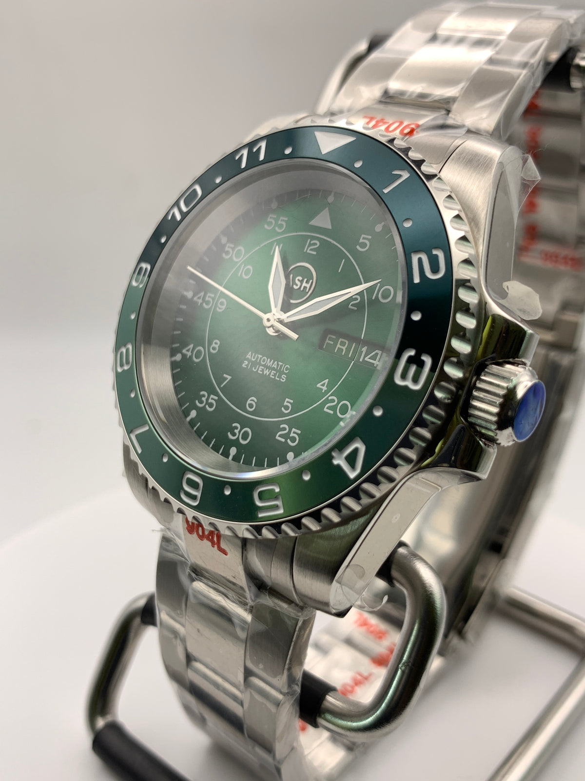 Dead Reckoning - 41mm Stainless Steel case with matching bracelet. Sapphire crystal. Seiko NH36 with green day/date wheels.