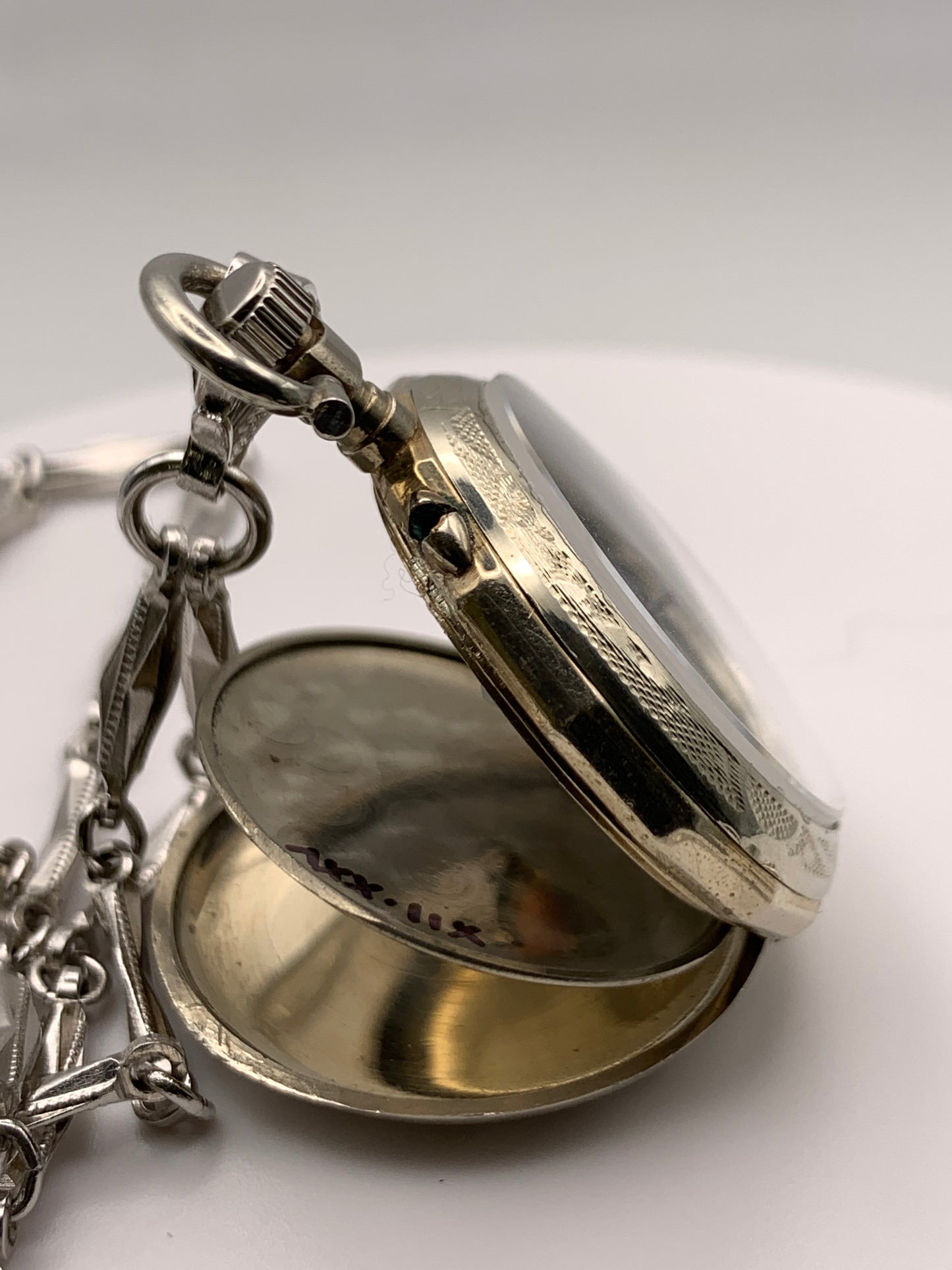 ‘Sold - Amuse-bouche. 30mm pocket / necklace watch. NOS Argentan alloy case and hand painted enamel dial. Sapphire crystal. Miyota 2036. 24” sterling necklace.