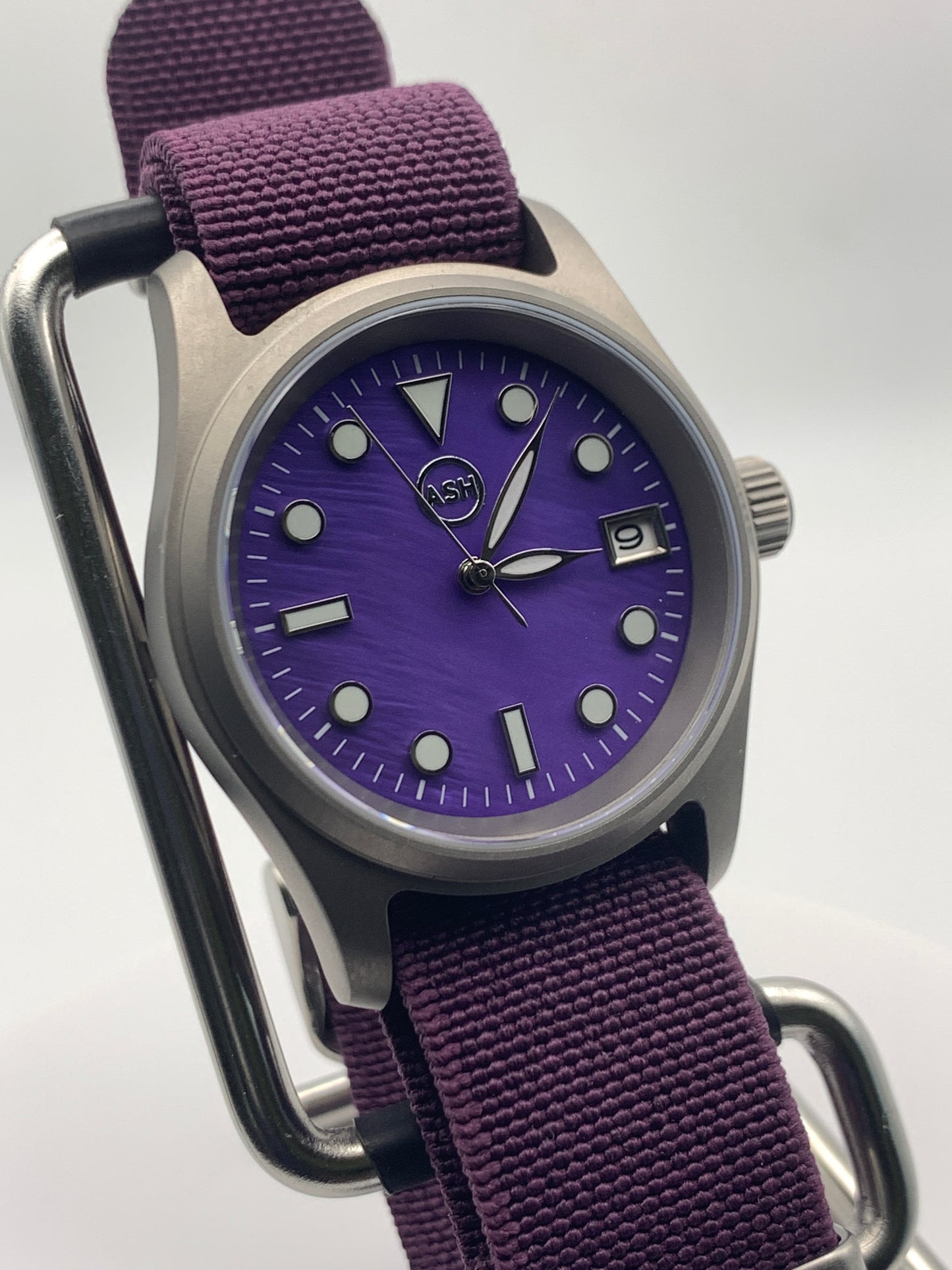 Larkspur. 36mm Titanium field watch. Purple MOP dial. Seiko NH35.