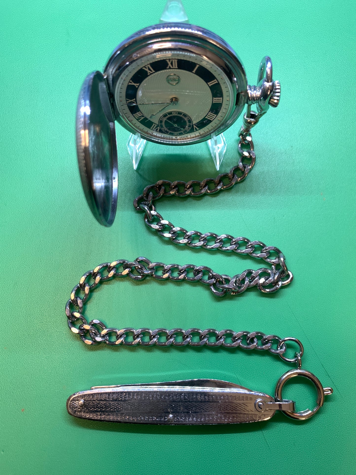 White Dahlia. All Swiss pocket watch. Beautiful NOS ETA/Unitas hammertone 6498 hand wound movement. Guilloche dial. Vintage 47mm case with perlage.