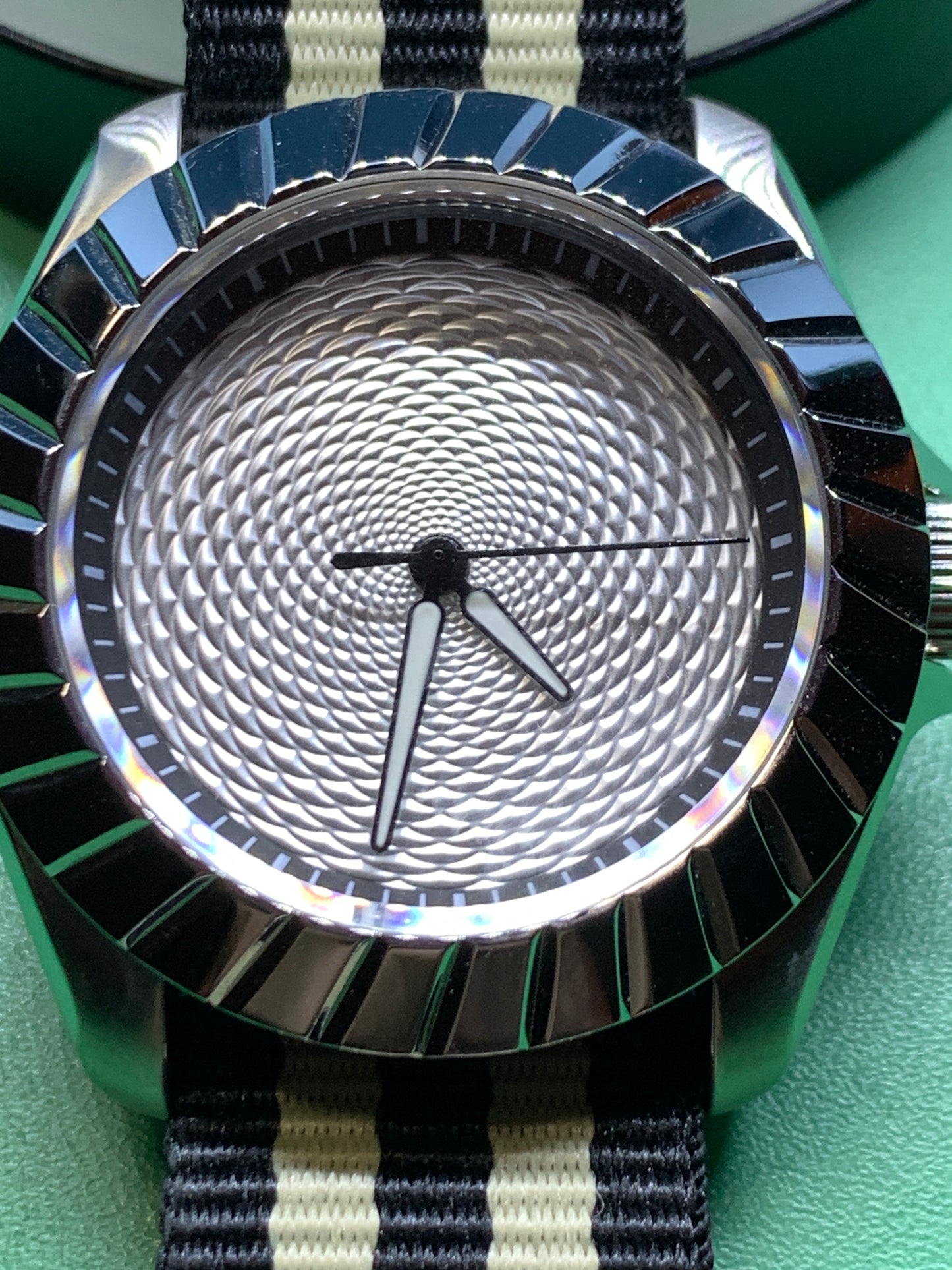 Indra’s Net. 41mm Stainless steel case.  Sapphire crystal. Seiko NH38.