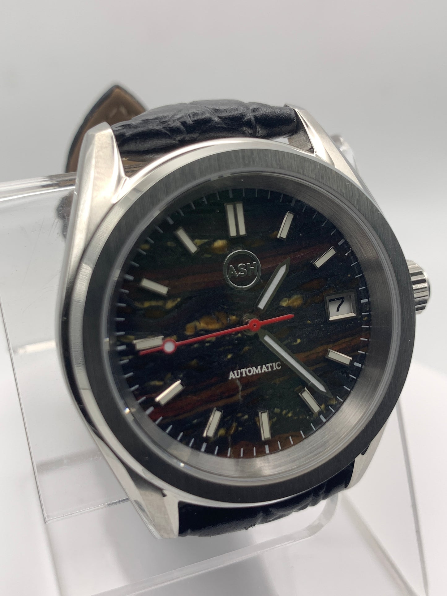 Agharta. 39mm Stainless steel. Iron Tiger Eye dial. Sapphire crystal. Seiko NH35.