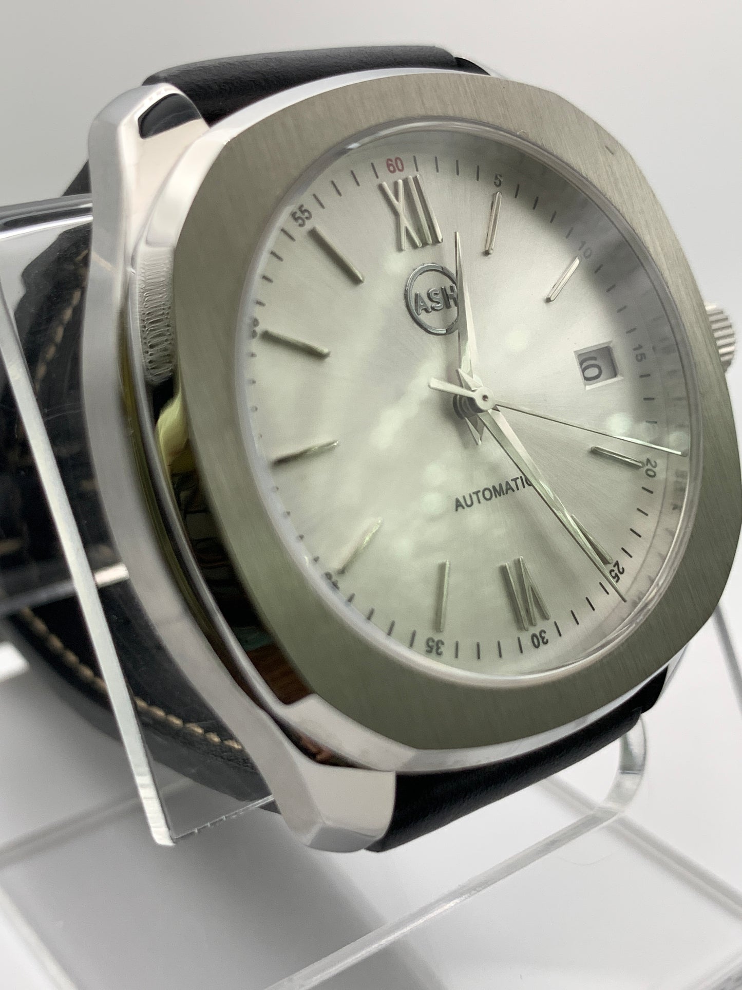 40mm Silver on silver dress watch.