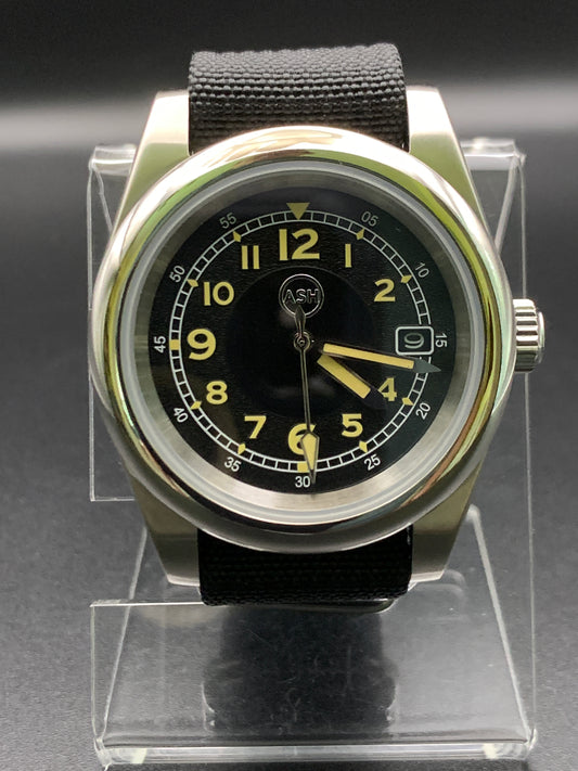 Black and yellow 39mm field watch.
