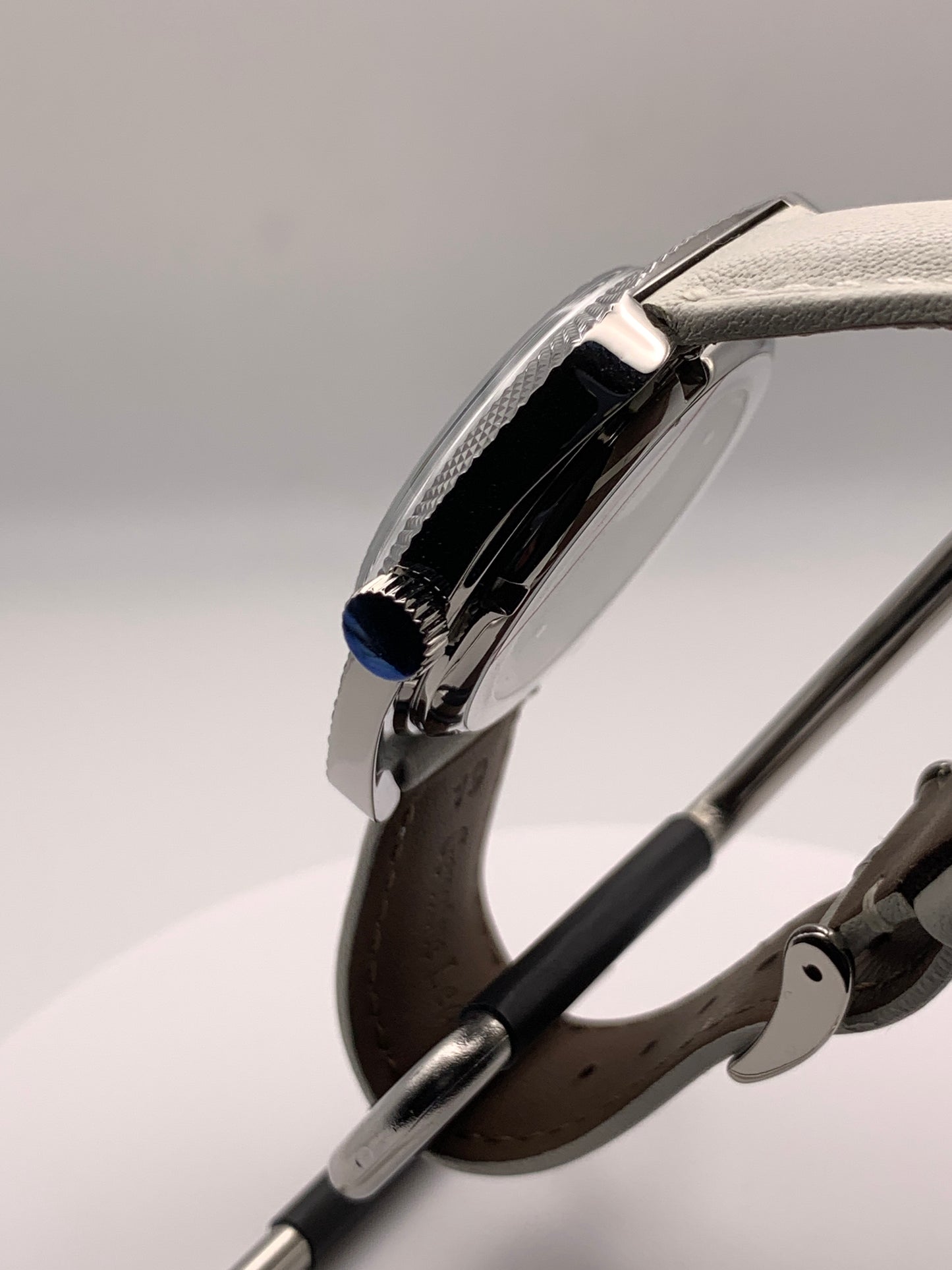 Lily. Faceted 37mm stainless steel case. Acrylic domed crystal. Charlotte stone dial.  Seiko VH31 mecha-quartz.