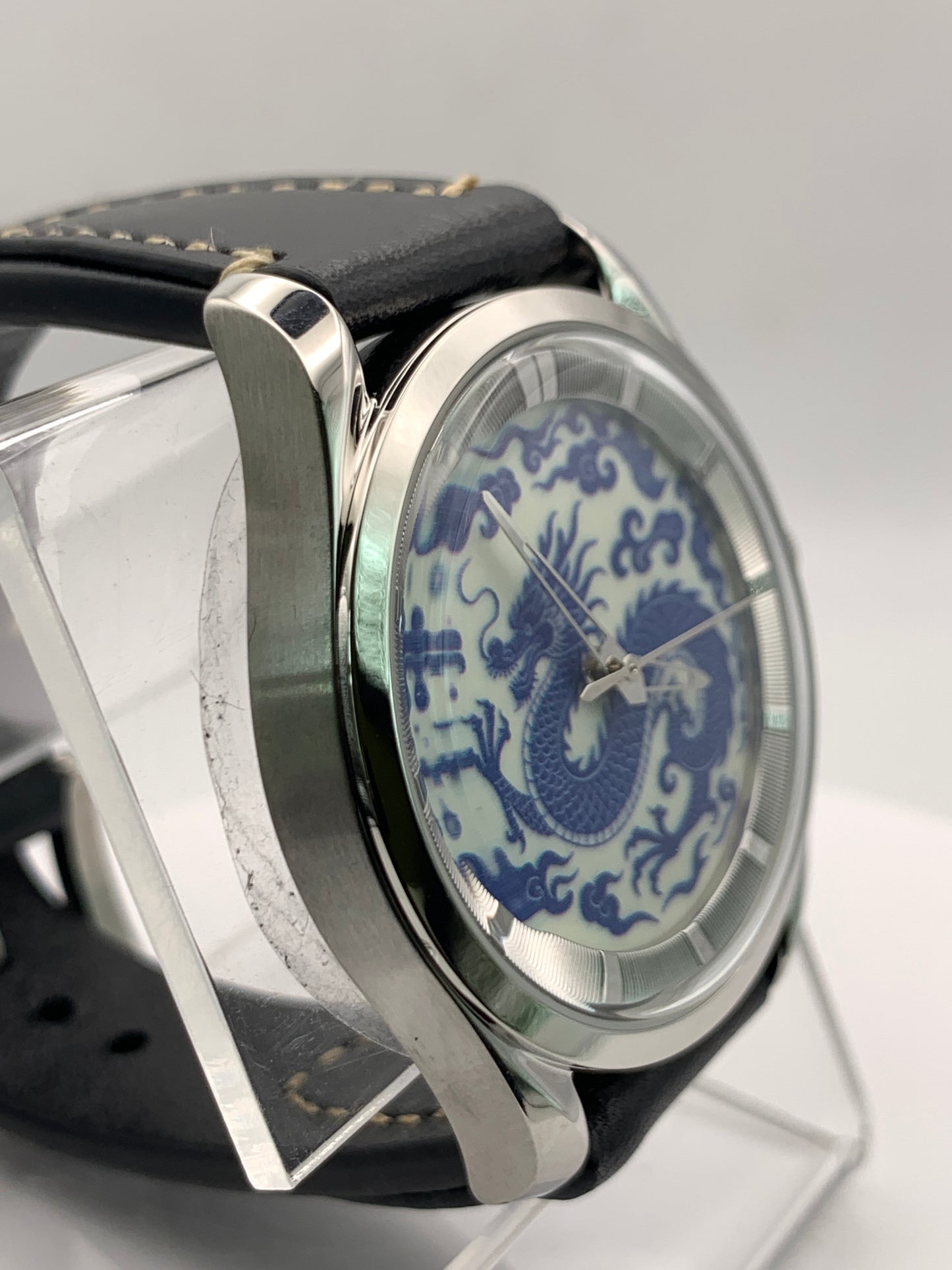 Qinglong - 39mm stainless steel case with engine turned chapter ring. Sapphire crystal. Seiko NH38.